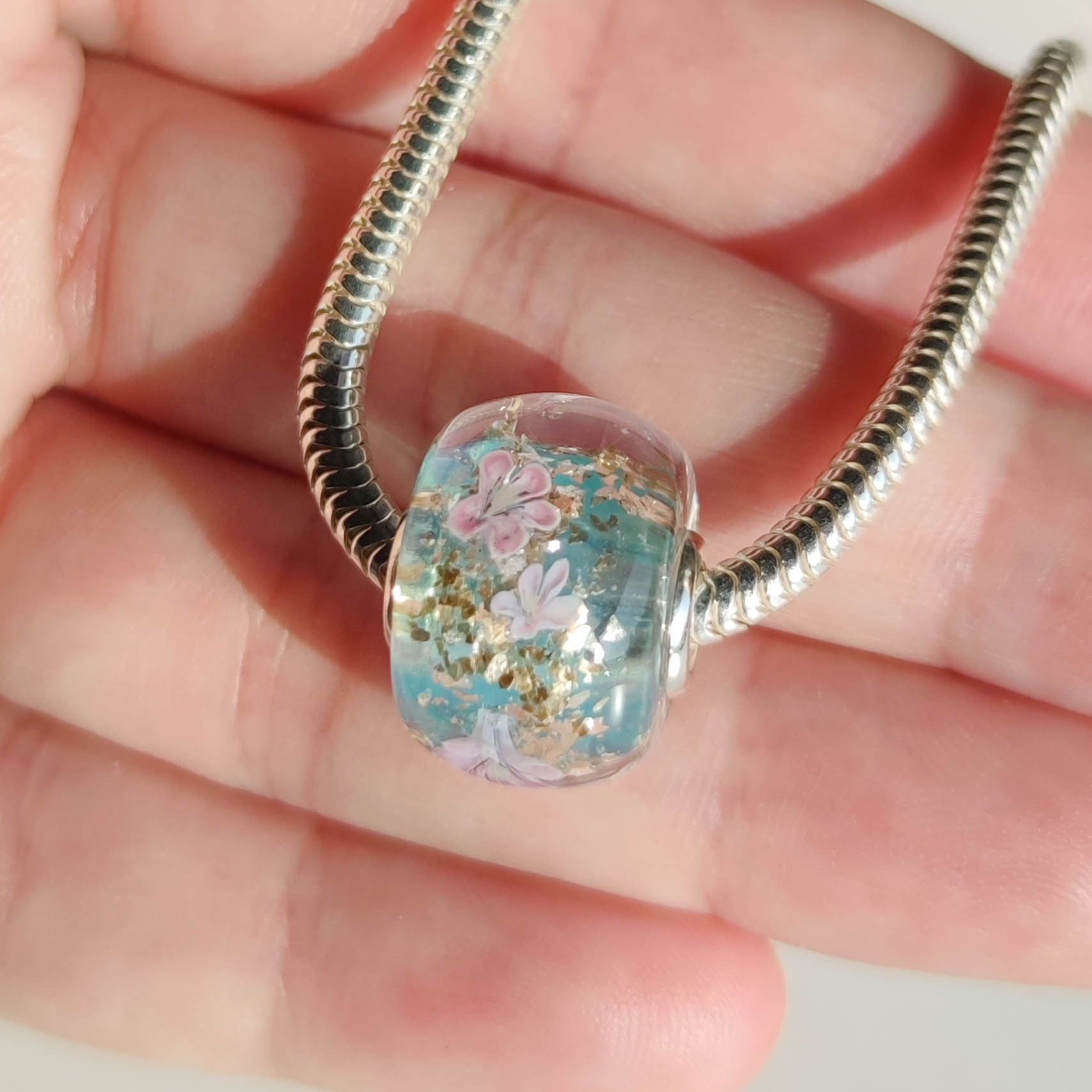Sakura on blue, gold flakes