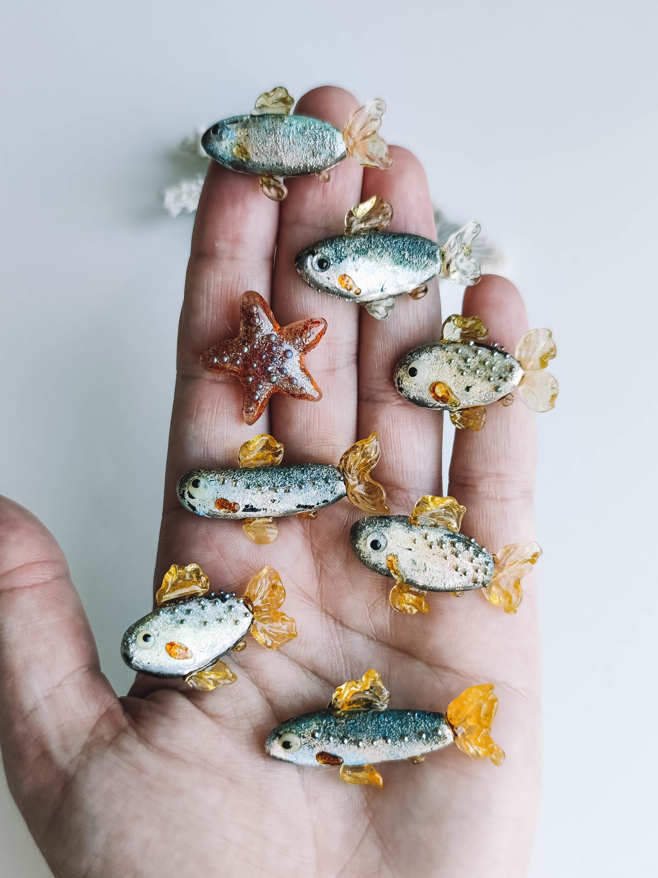 Fish badge brooch