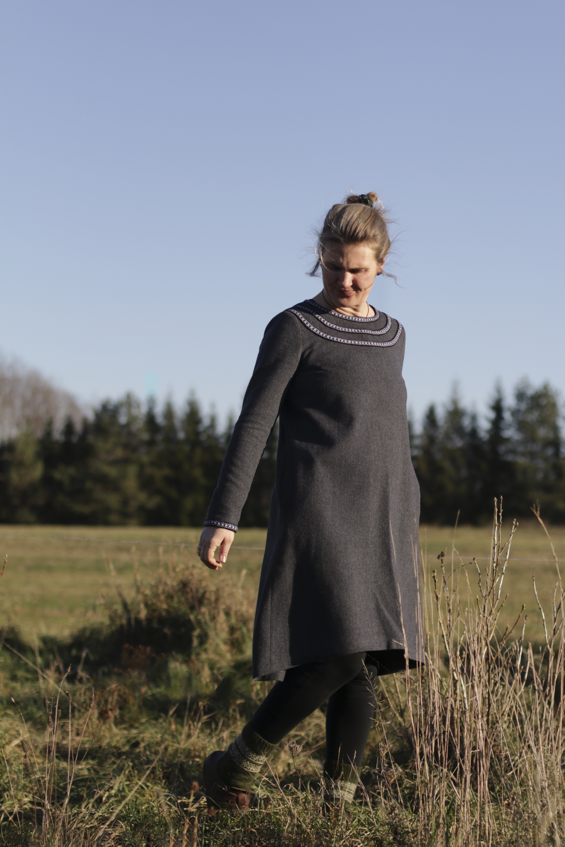 Woolen dress adorned with woven bands