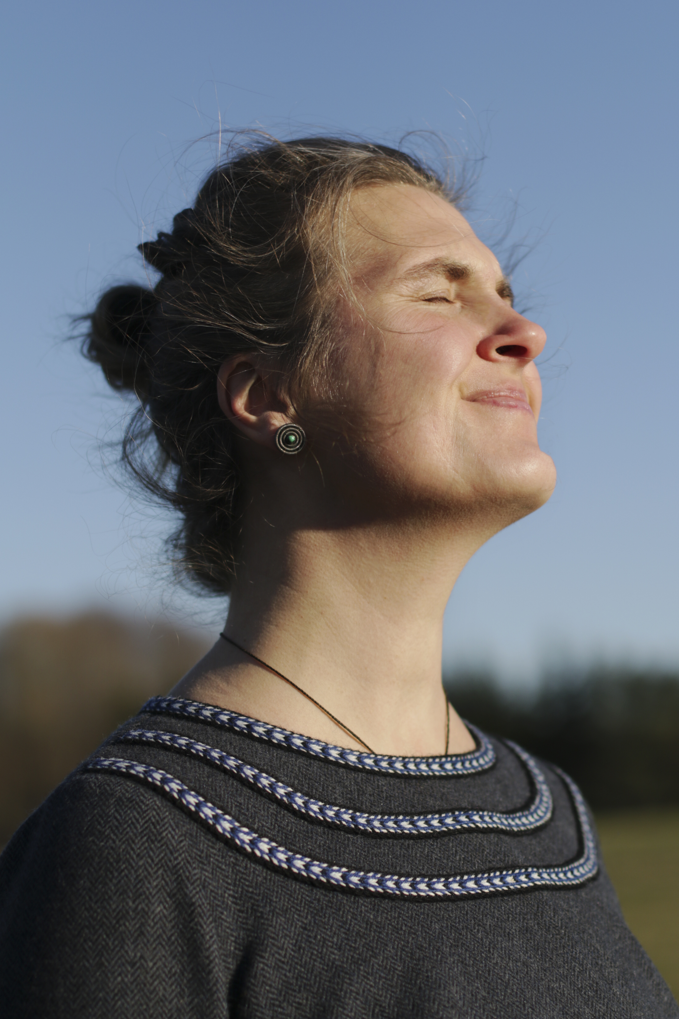 Woolen dress adorned with woven bands
