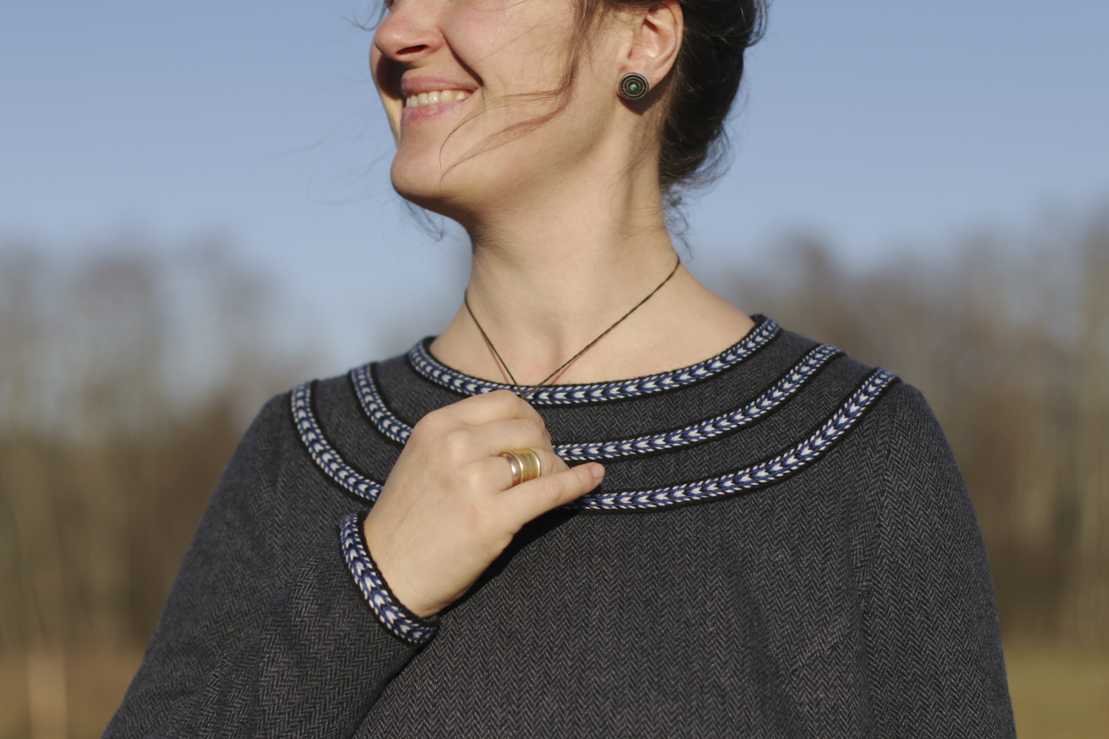 Woolen dress adorned with woven bands