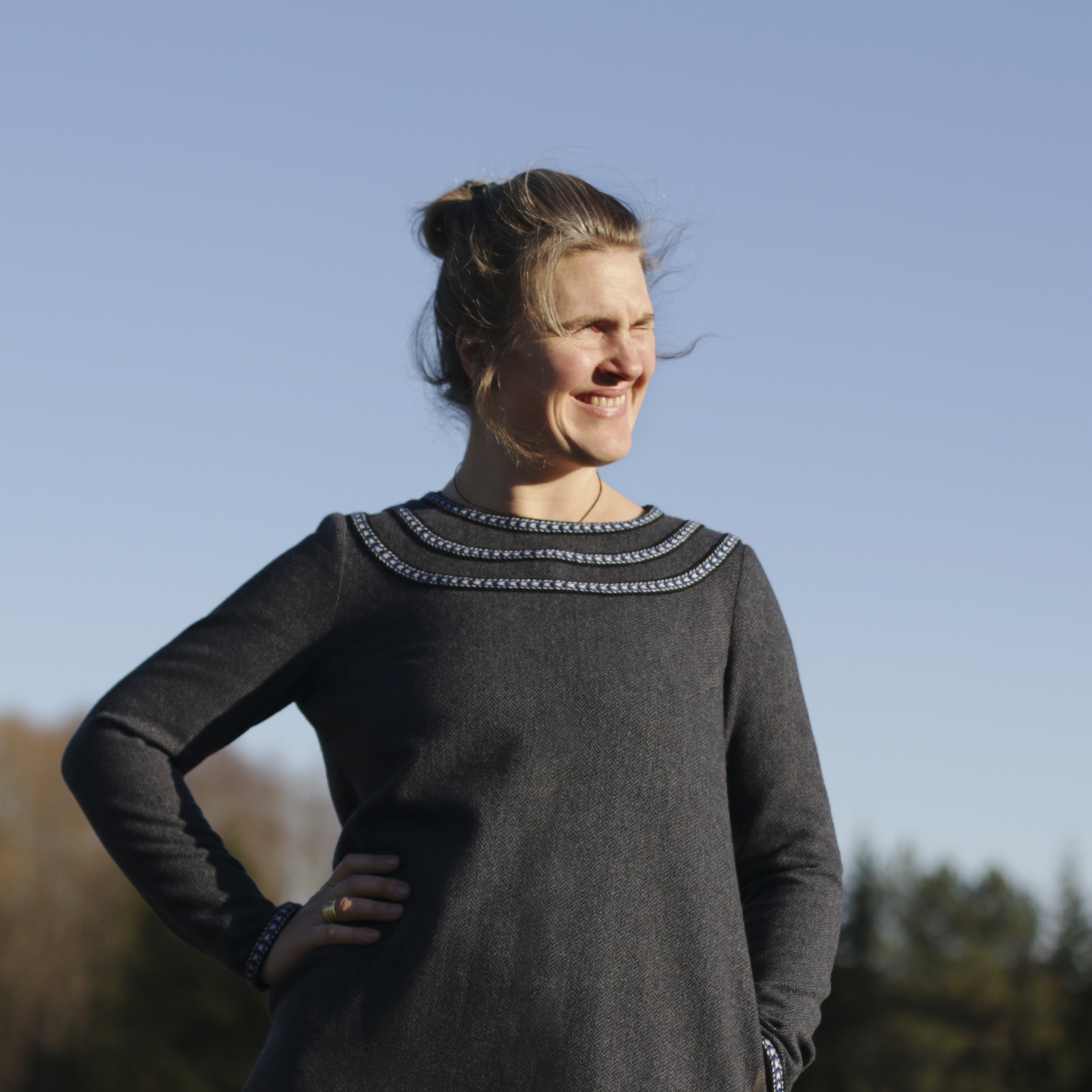 Woolen dress adorned with woven bands