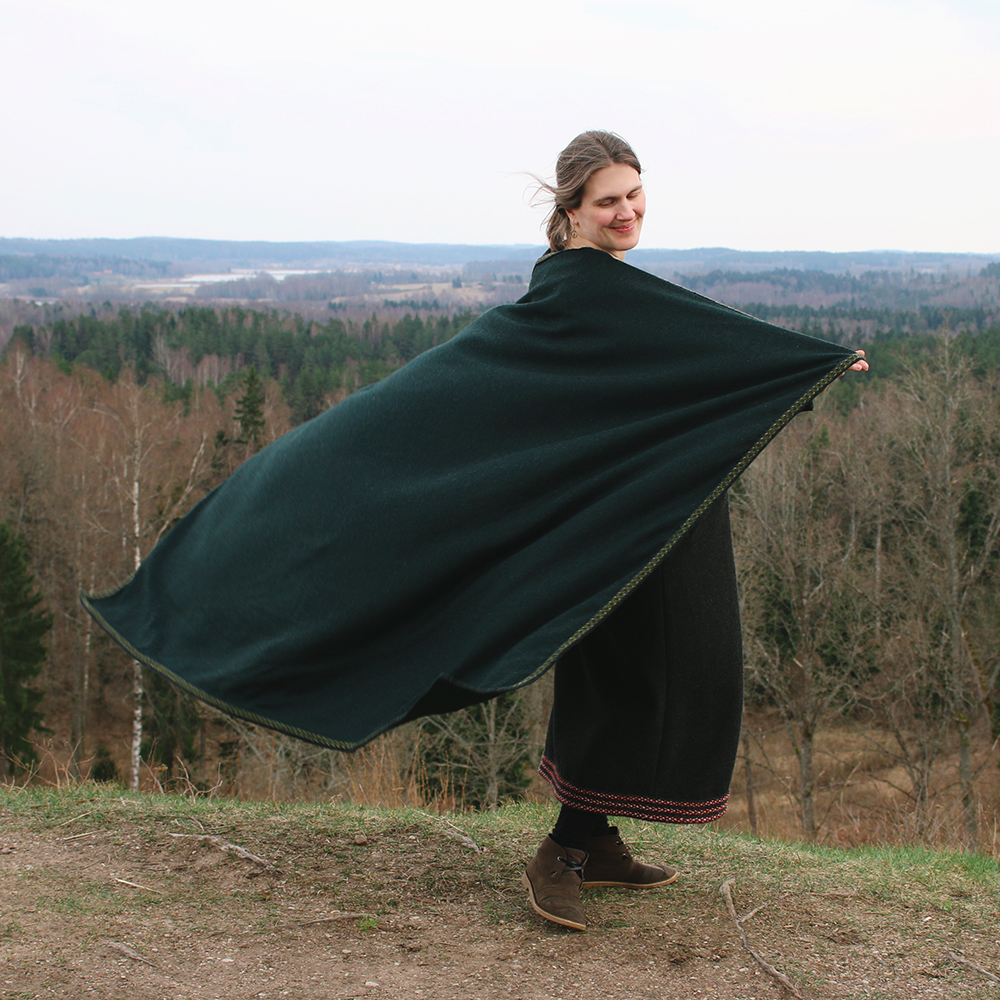 Wool cloak adorned with a wide woven band