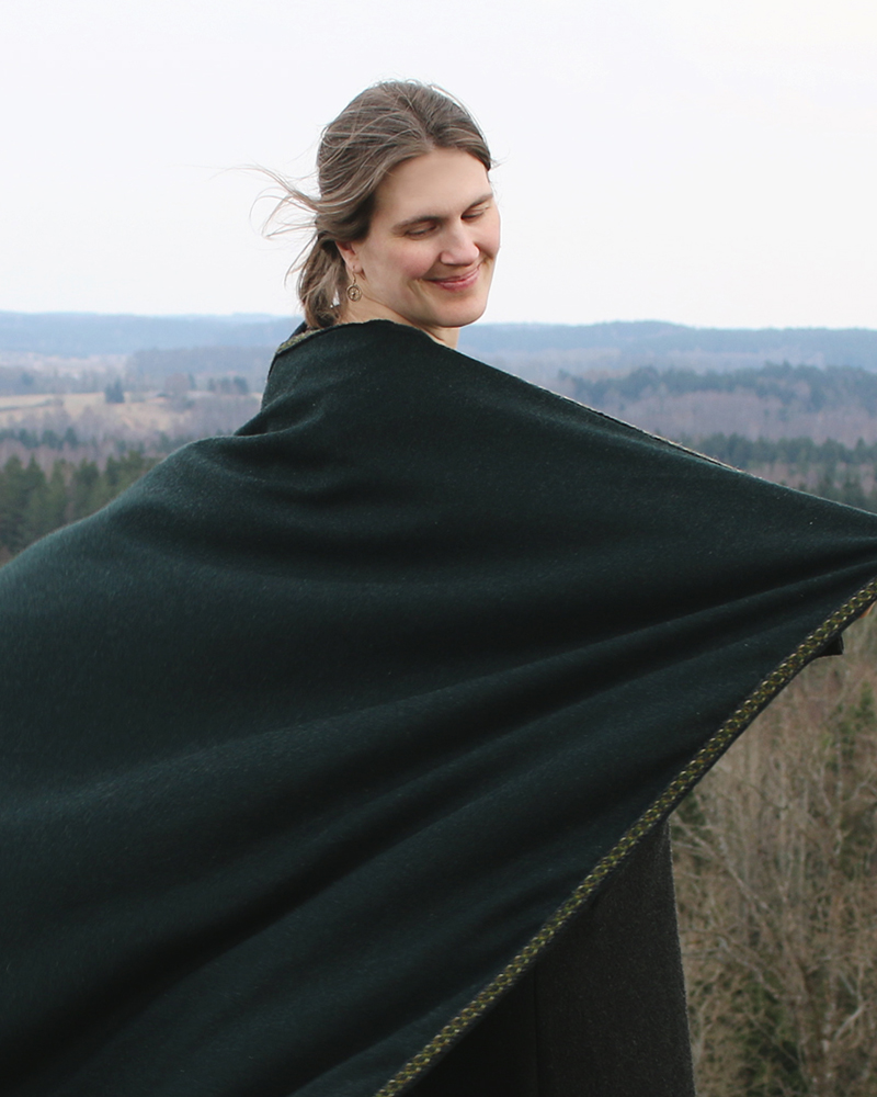 Wool cloak adorned with a wide woven band