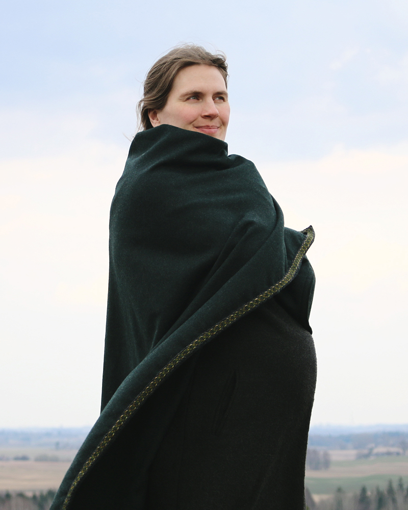 Wool cloak adorned with a wide woven band