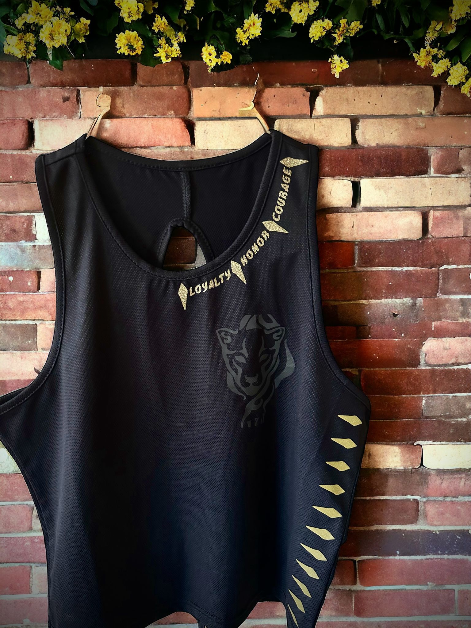  Elevate your active lifestyle with the " Lioness " Tanks, the embodiment of Strength &  Sophistication.