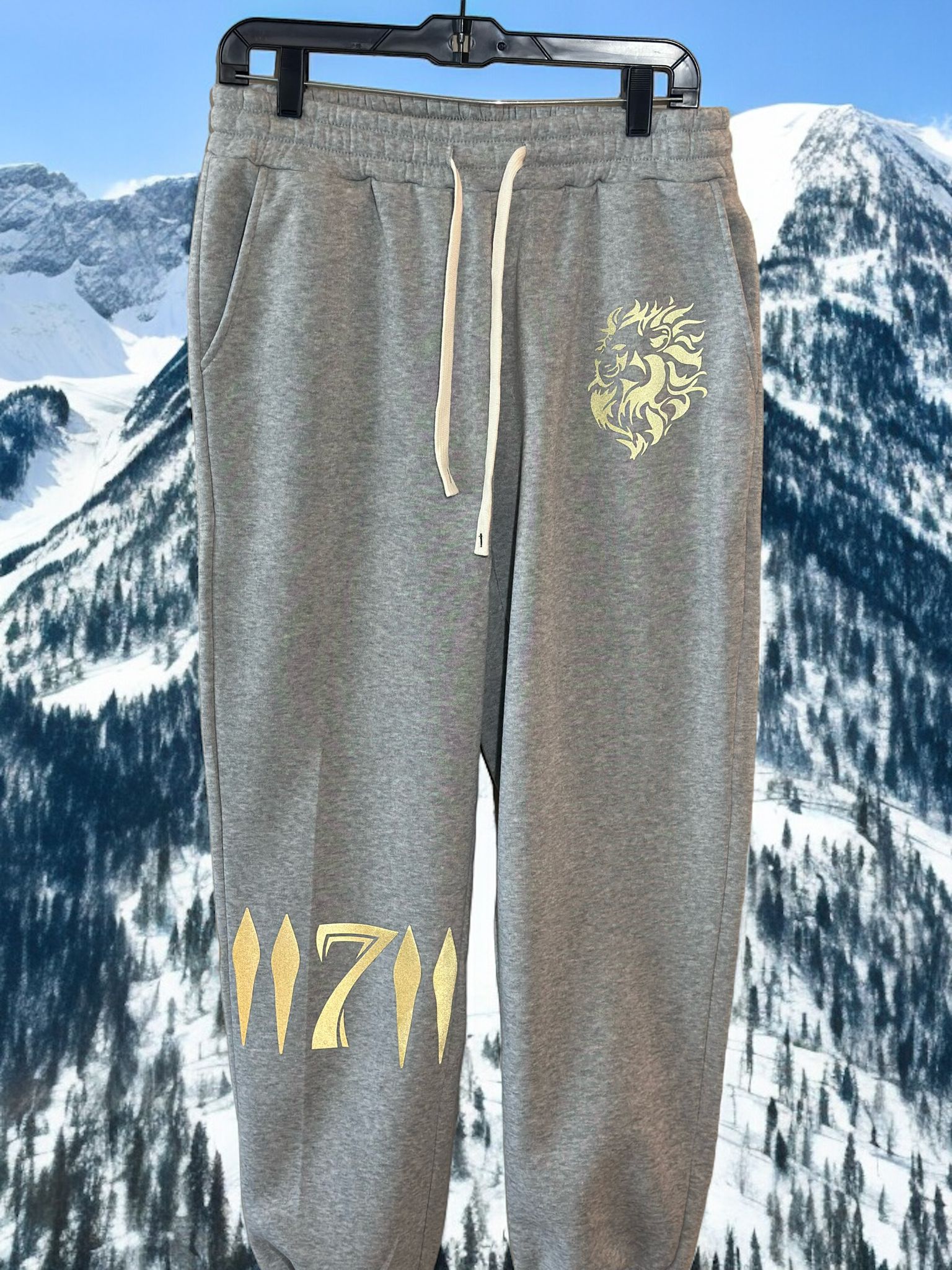 The 7 Lion Alpha Sweatpants, available in Grey, Black, Sky Blue, and Tan