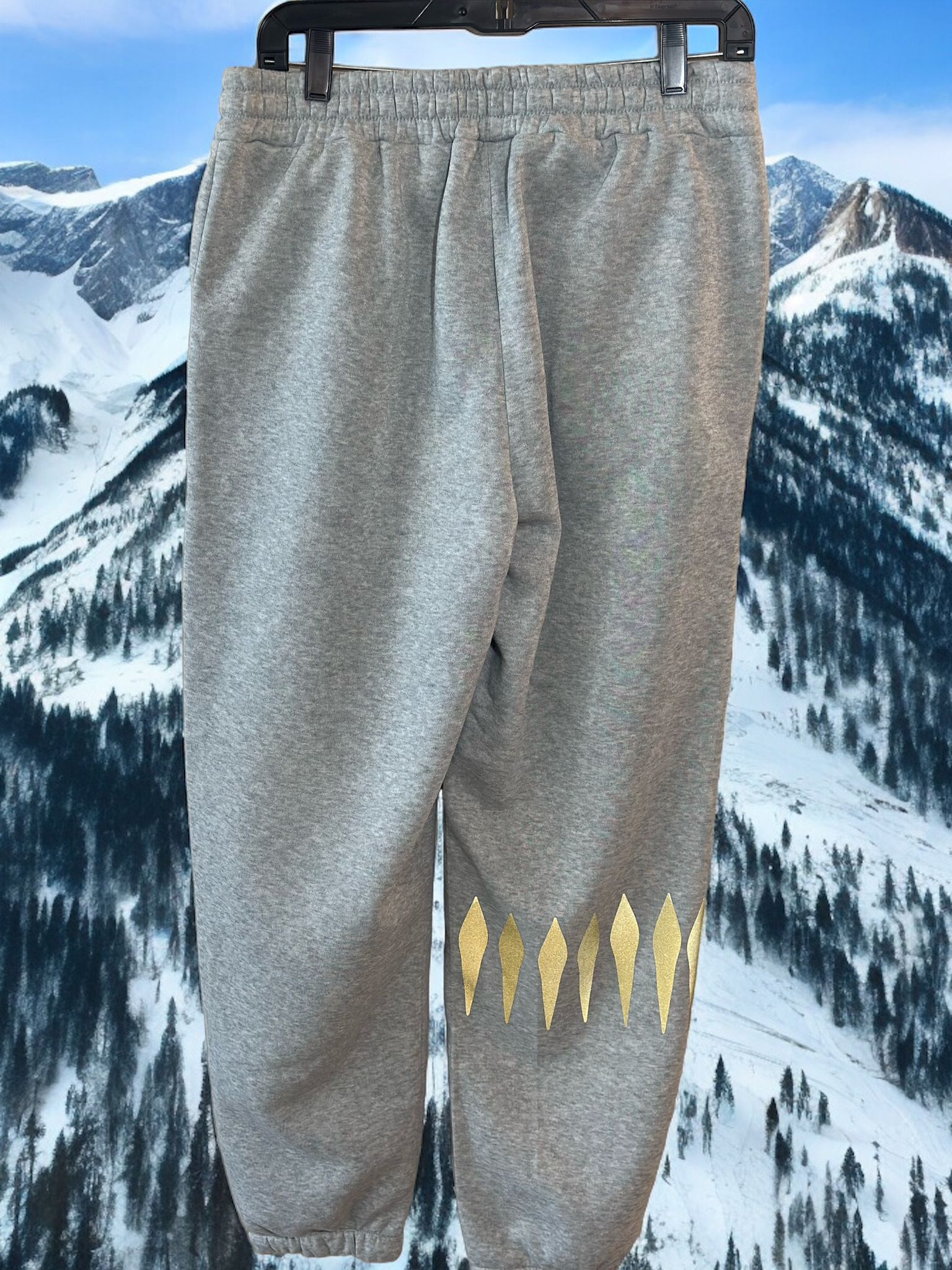 The 7 Lion Alpha Sweatpants, available in Grey, Black, Sky Blue, and Tan