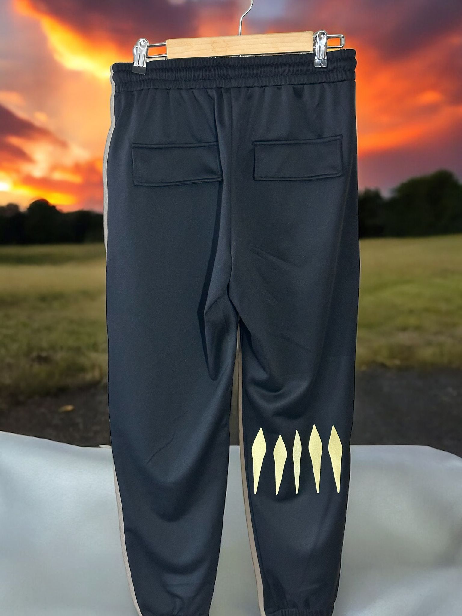 The 7 Lion Alpha Sweatpants, available in Grey, Black, Sky Blue, and Tan