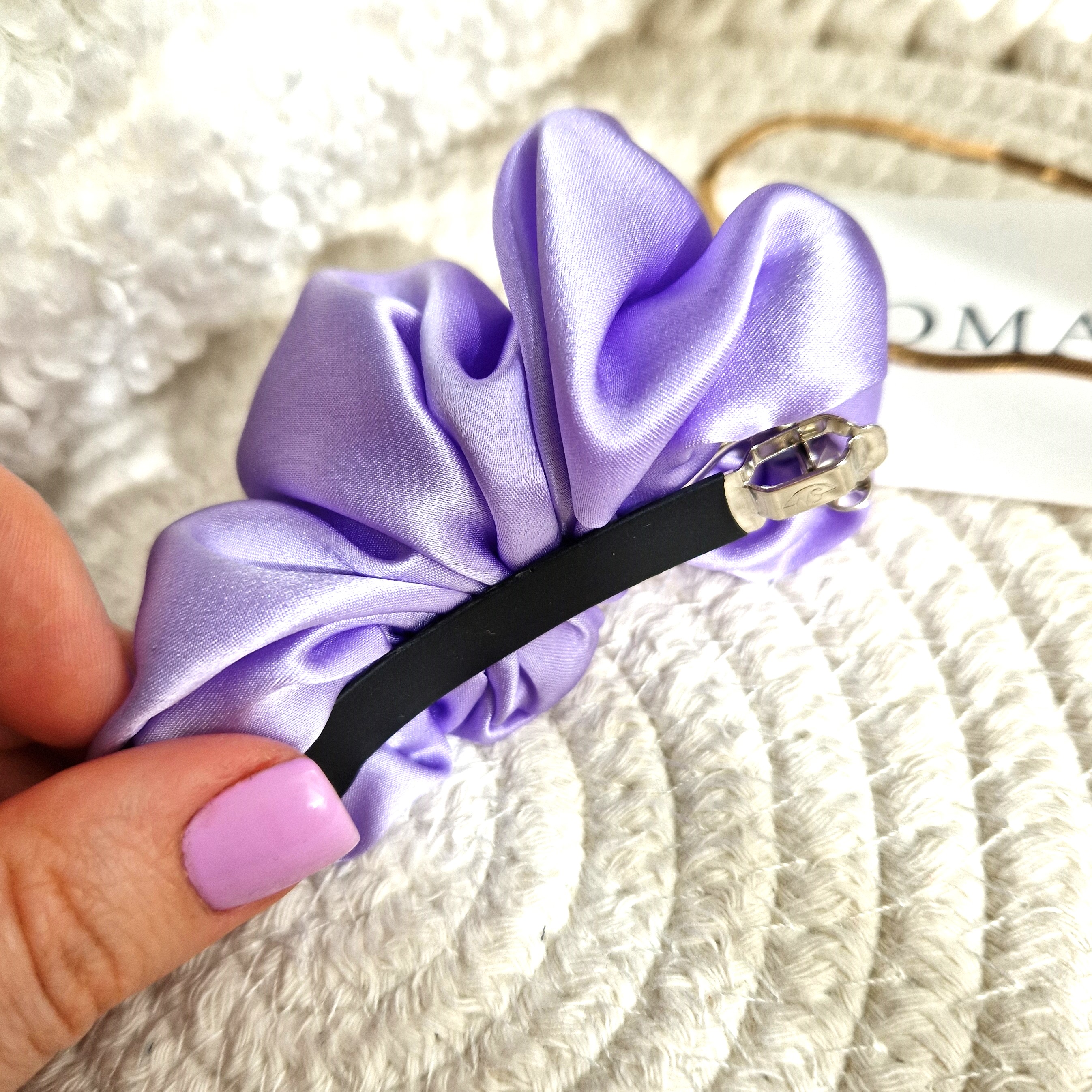 Šviesus alyvinis segtukas