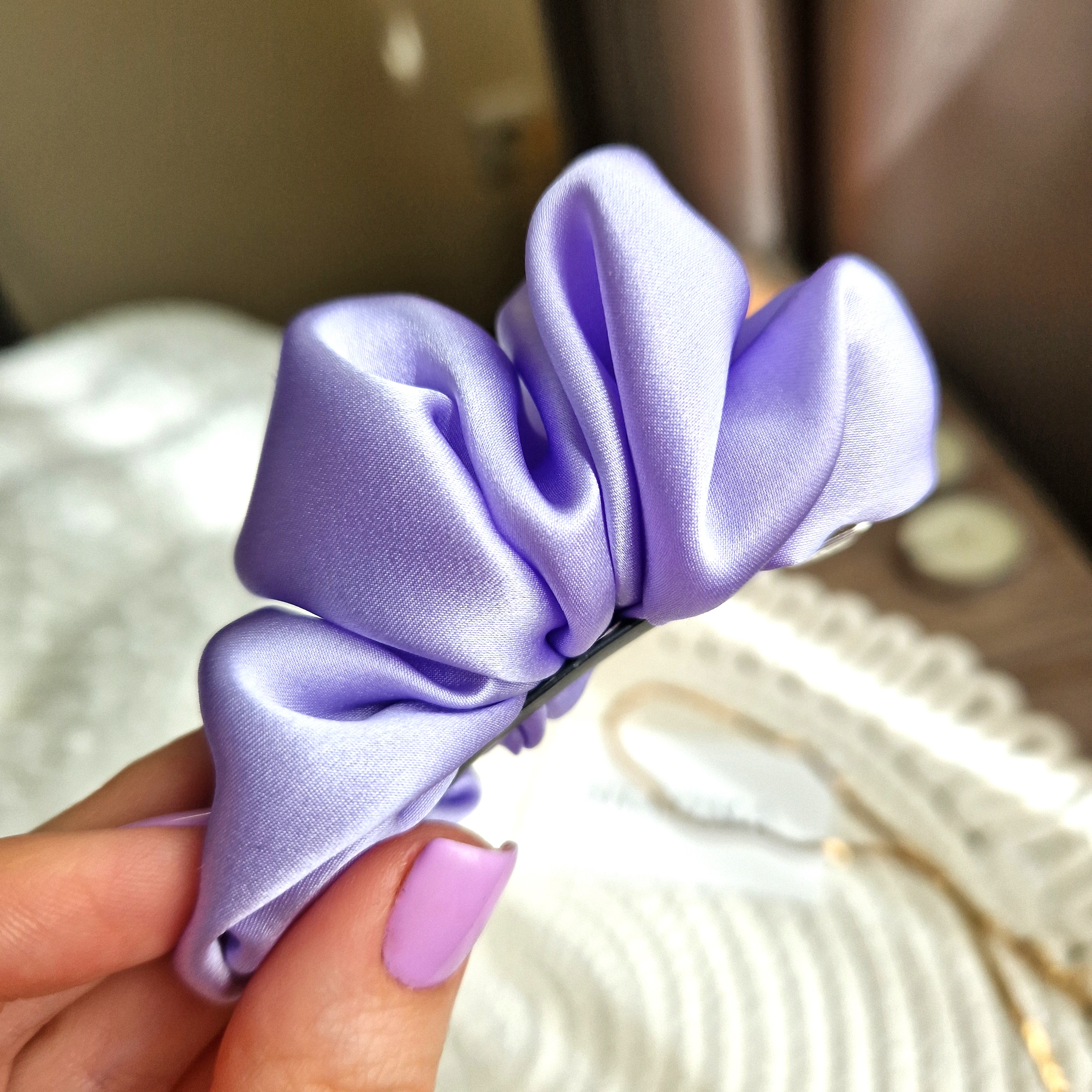 Šviesus alyvinis segtukas