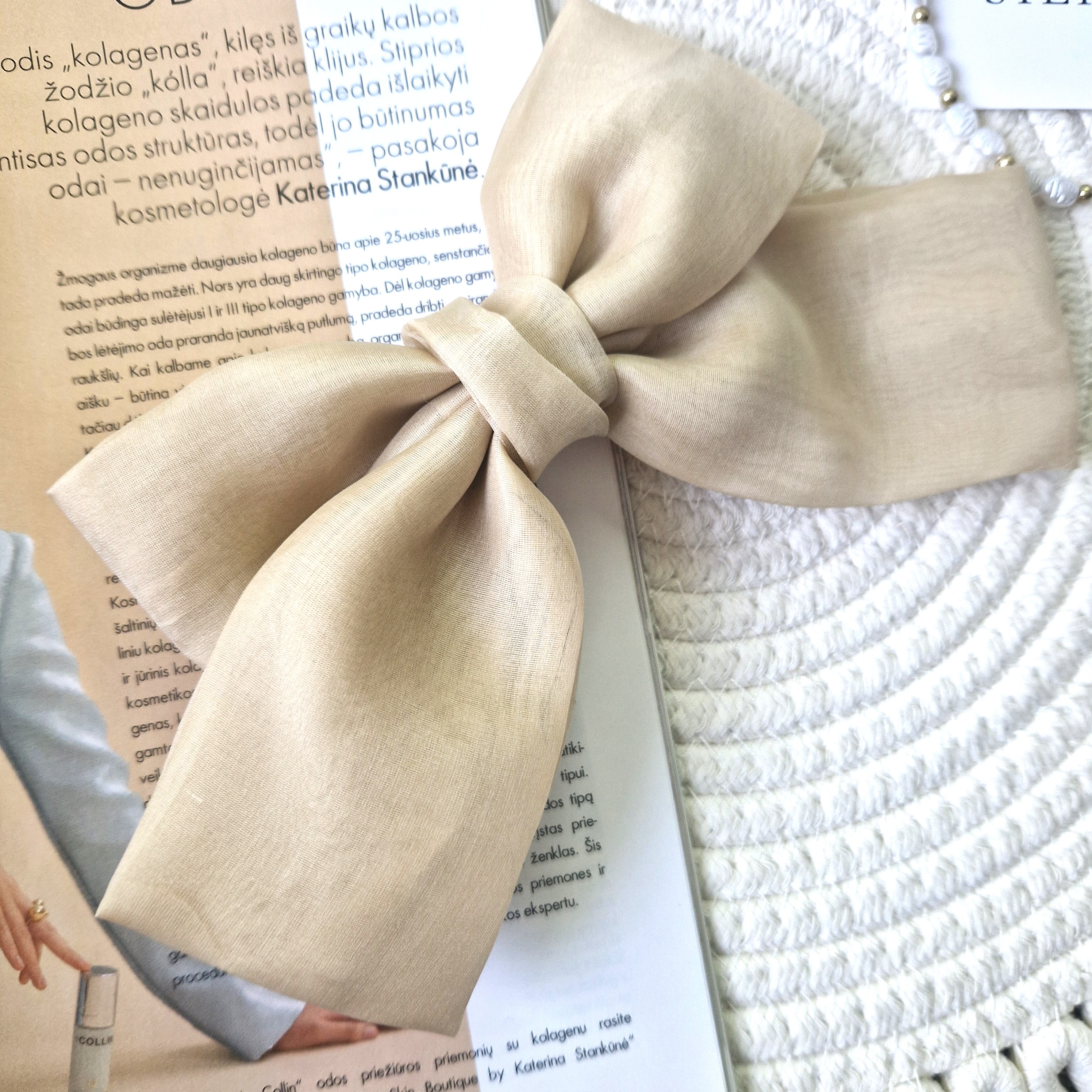 Šviesus kreminis organzos kaspinas