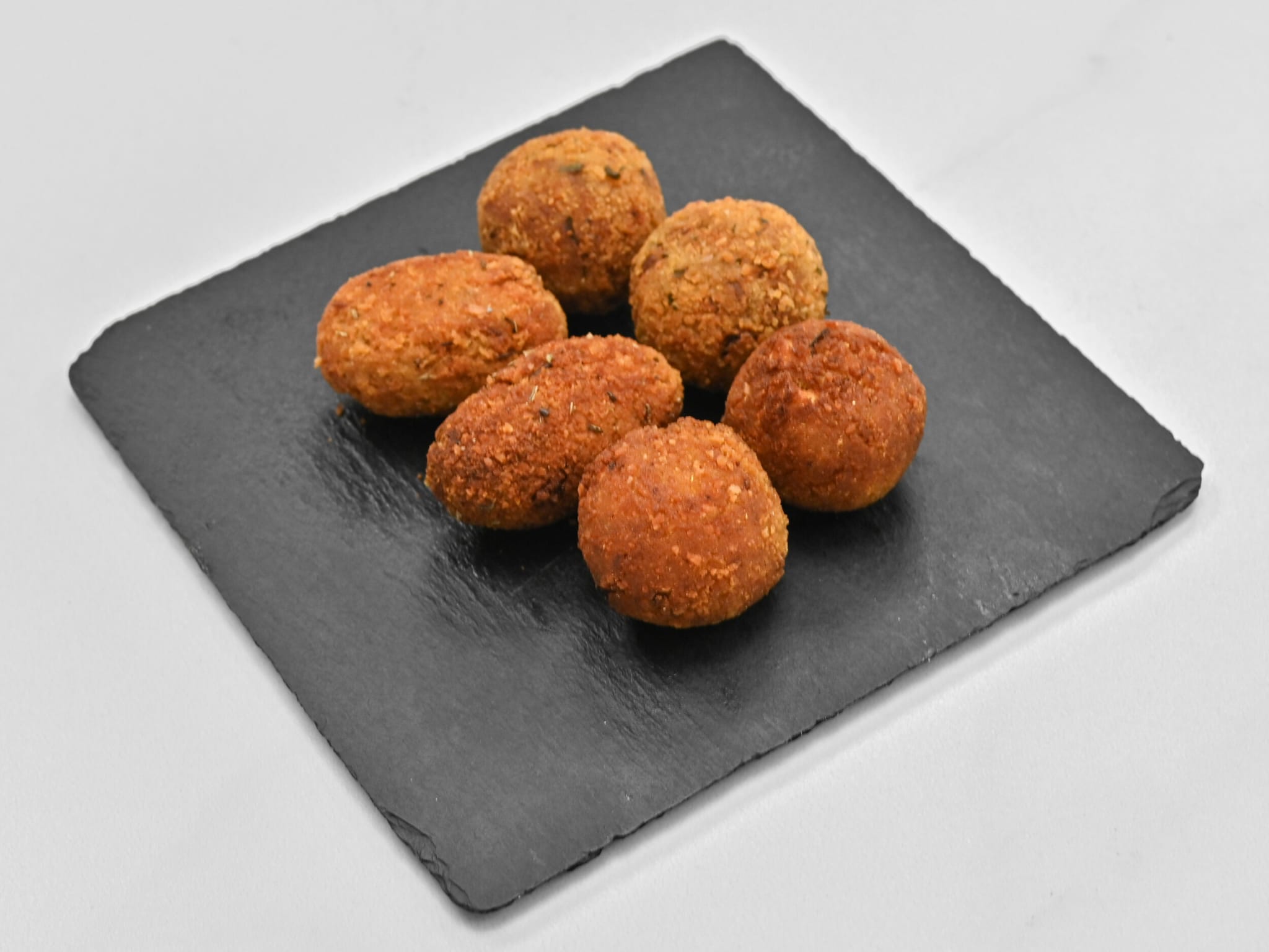 Surtido de croquetas caseras de setas, rustit y sobrasada con queso
