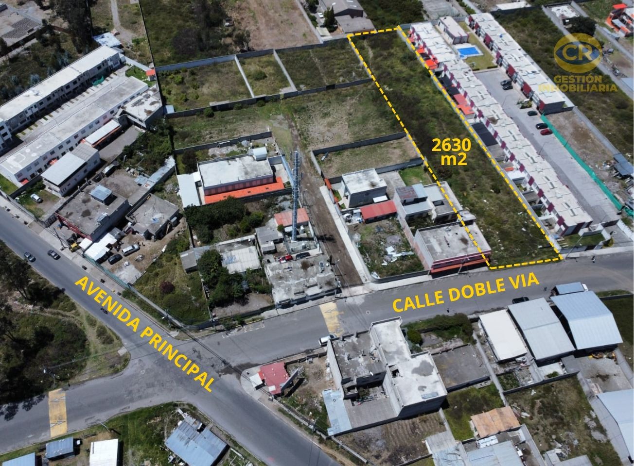 Terreno 2630 m2 en Calderón, Sector Comercial, En Calle Principal