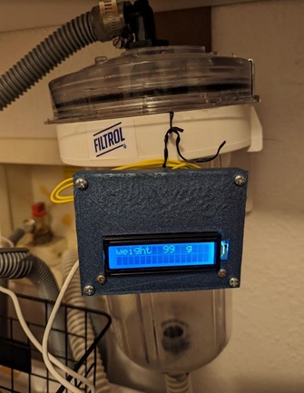 Real time laundry wastewater filter and weight measurement system