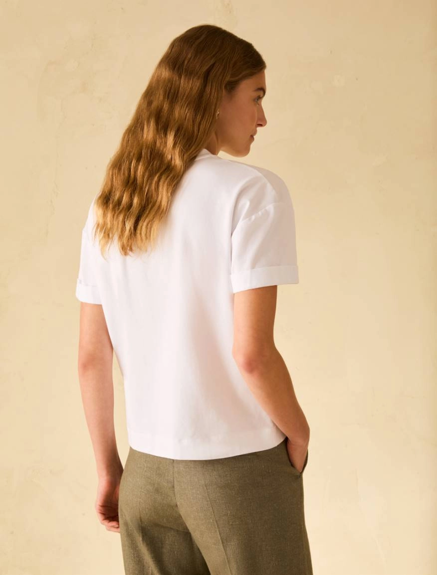 T-shirt con stampa e strass