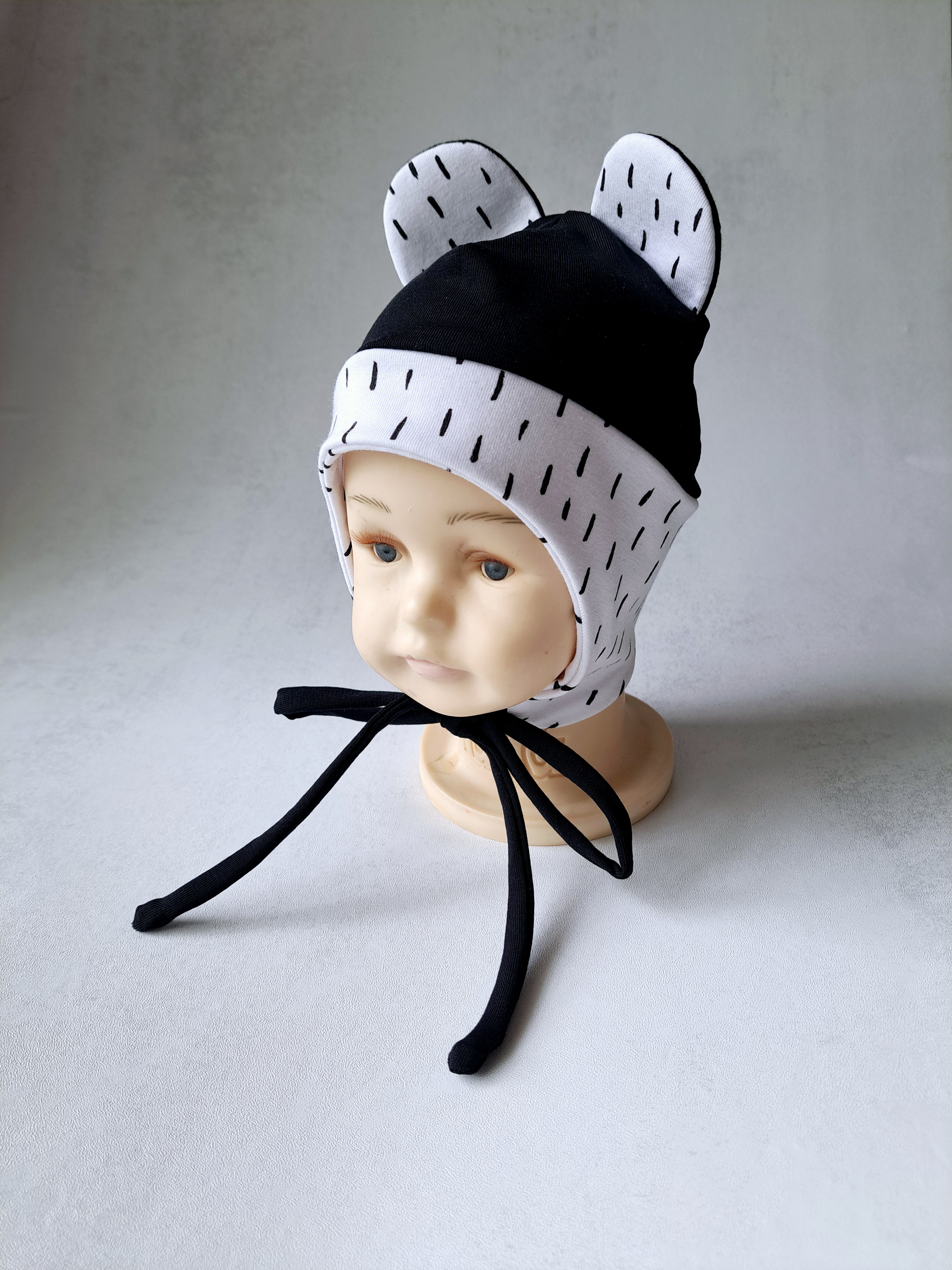 (42d, 44d) Plonesnė kepurė su raišteliais