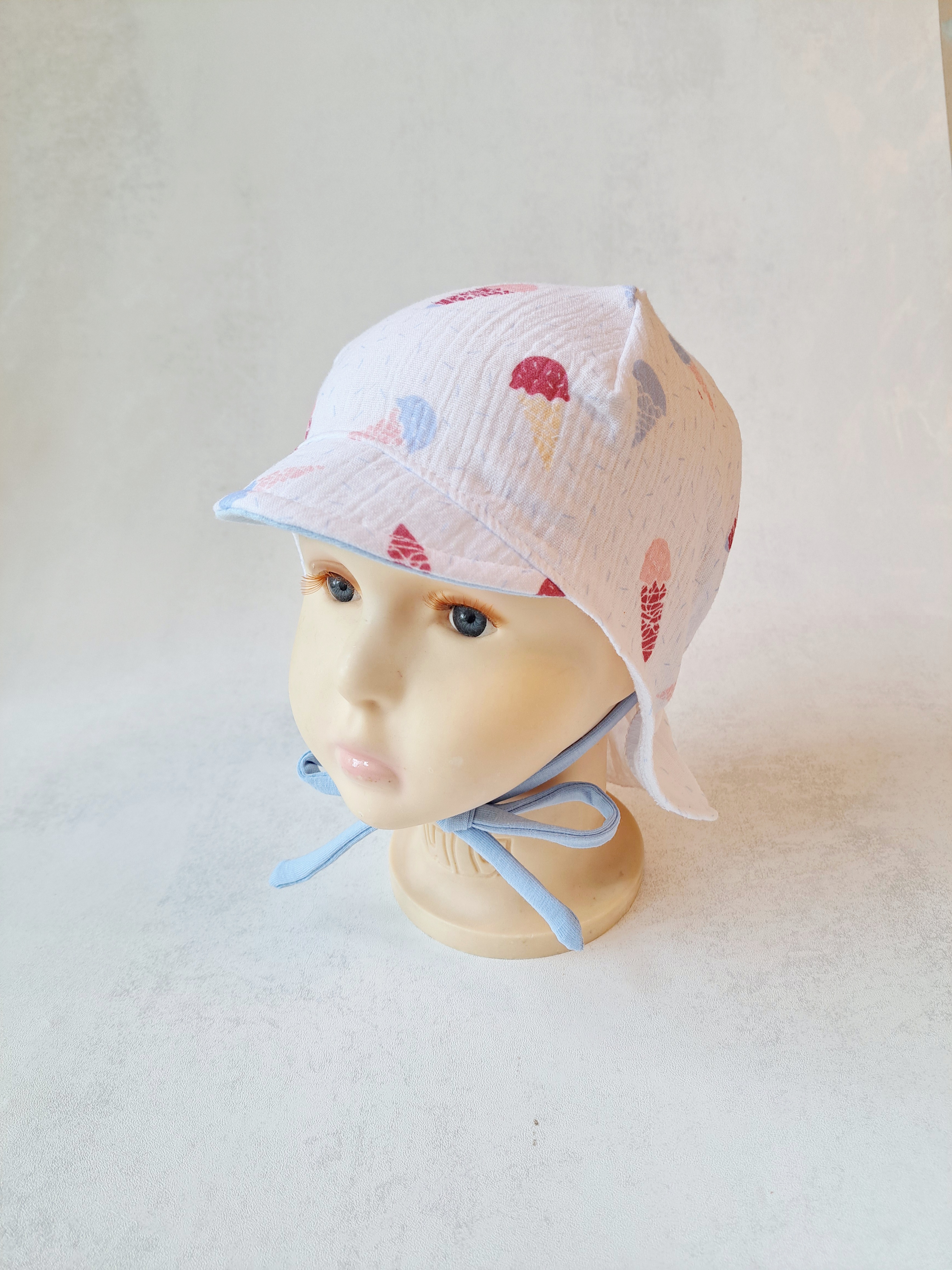 Muslino kepurė su snapeliu ir kaklo apsauga