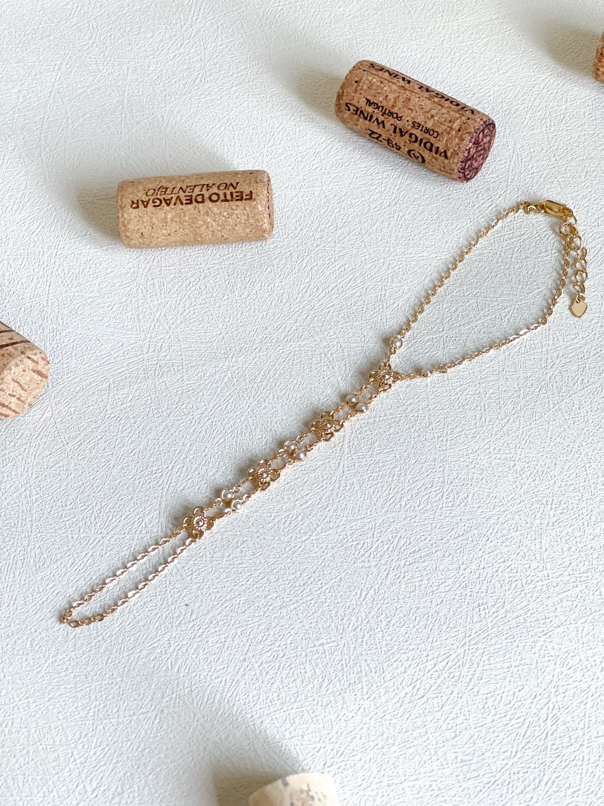 Pulseira de mão com pérola