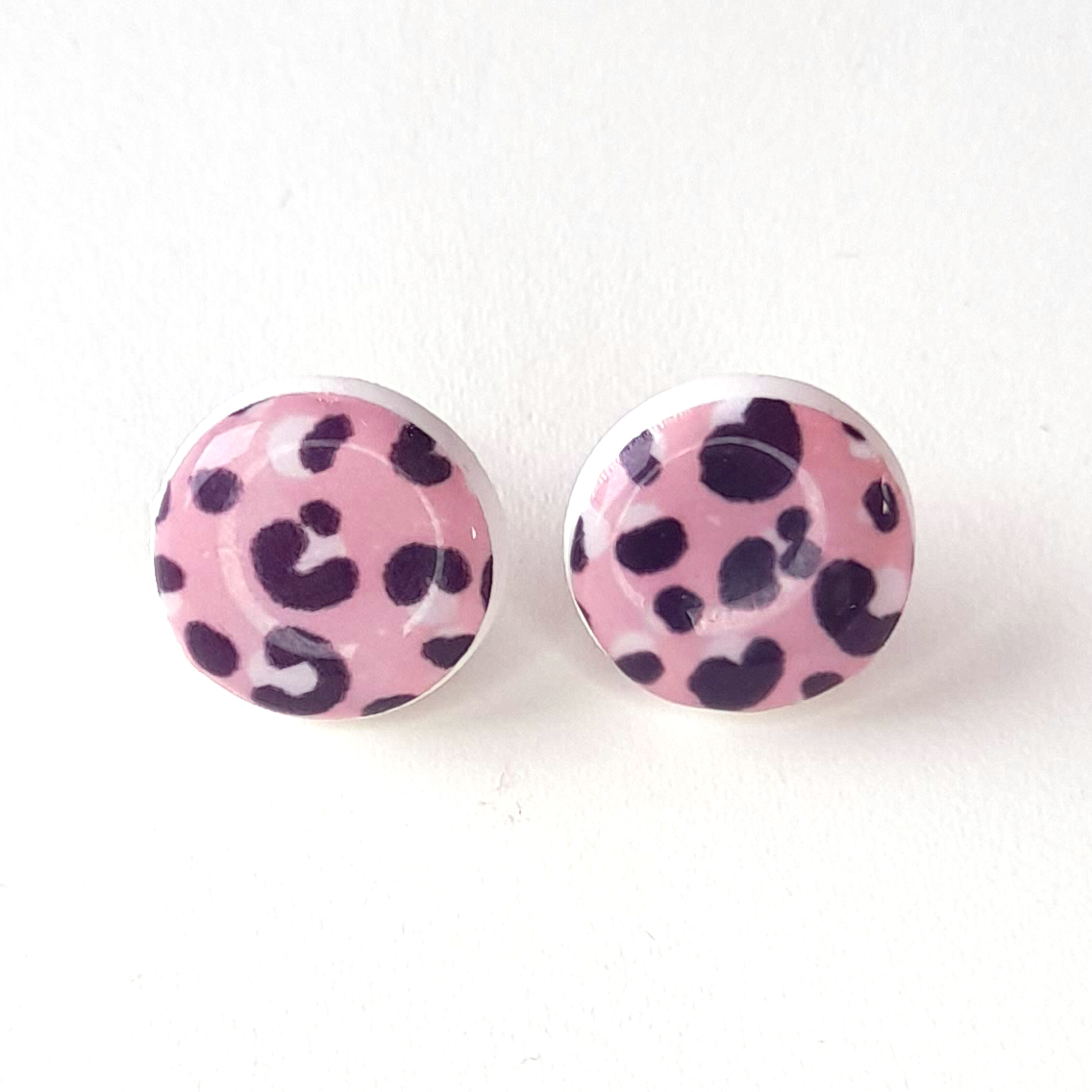 ANITA statement studs in blush pink and dark grey