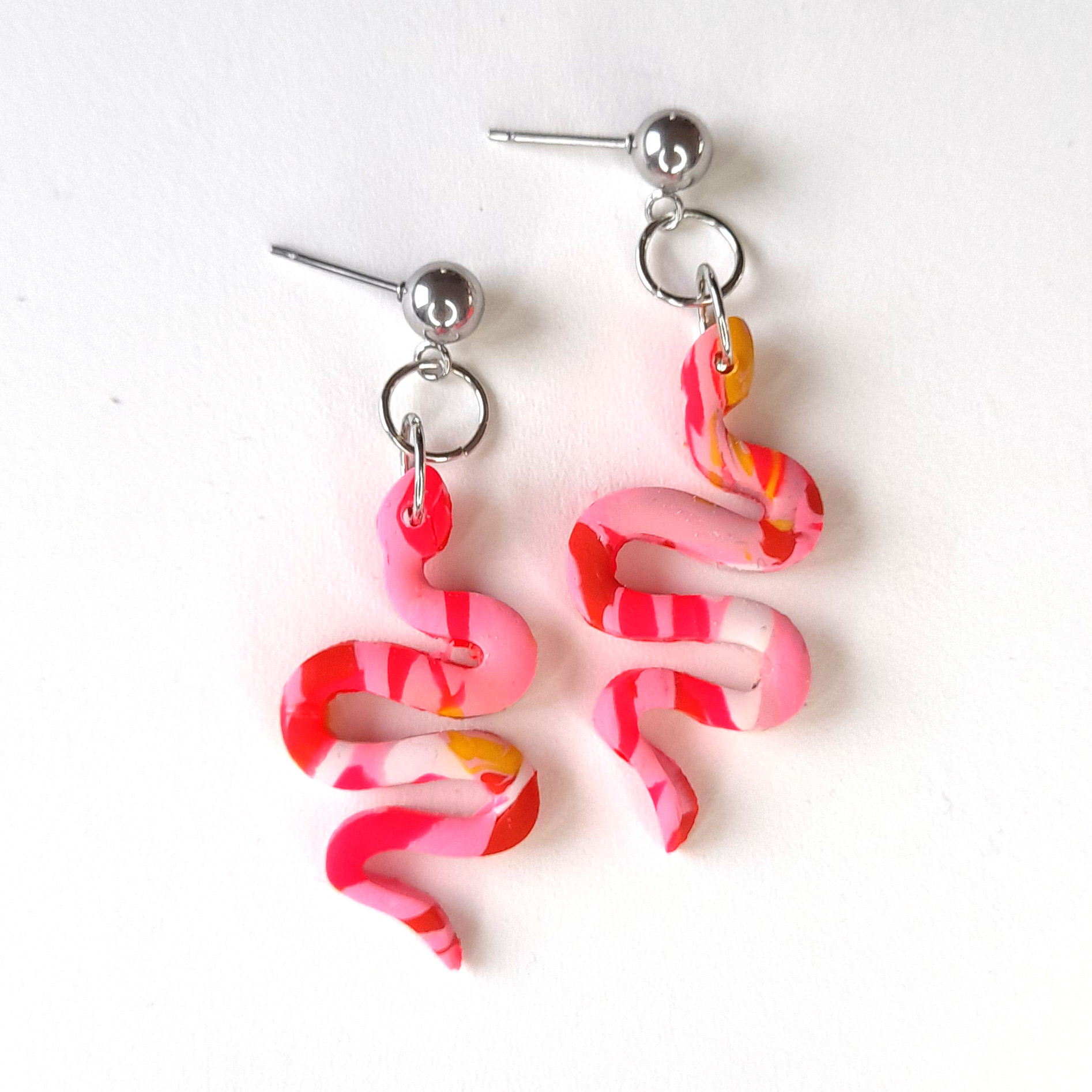 SERPENTIA statement dangles in light pink, hot pink and orange
