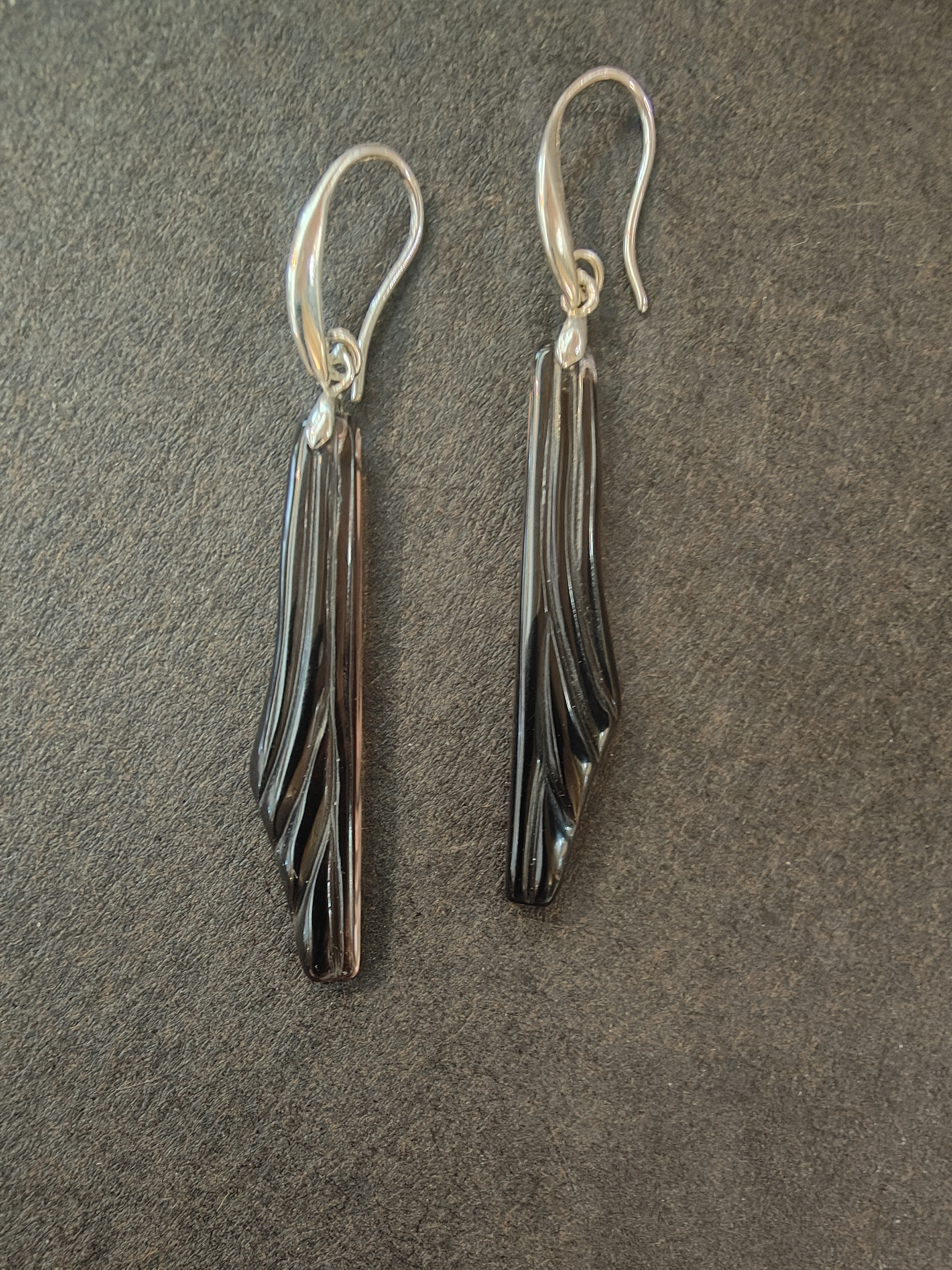 Koekoea tail feather earrings
