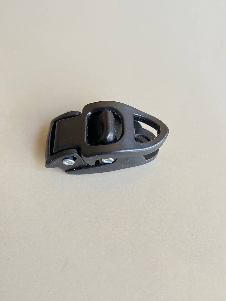 Powerstrap Lock Button