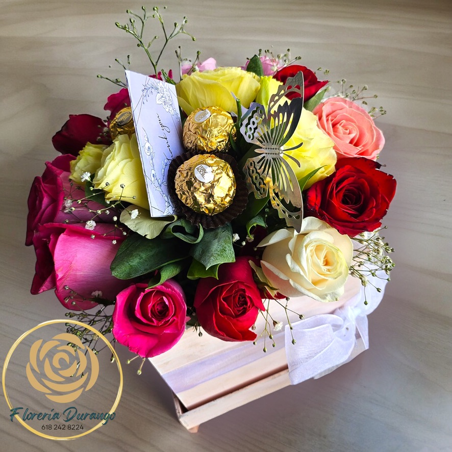Bouquet de rosas y ferrero