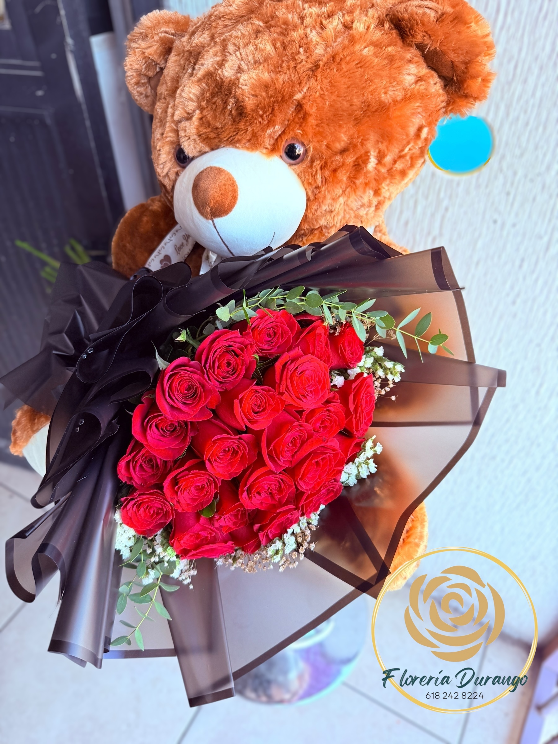 oso de peluche con ramo