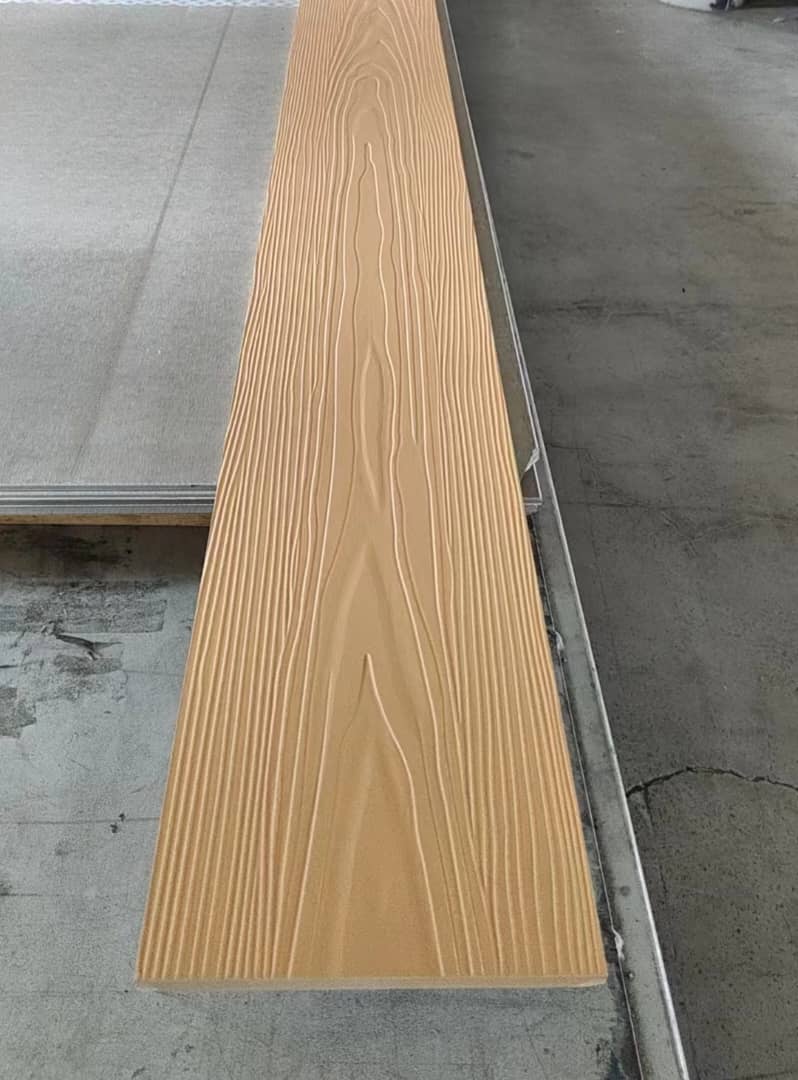 Wood-textured composite planks