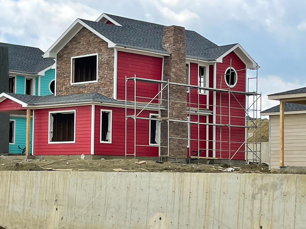 Wood-textured composite planks