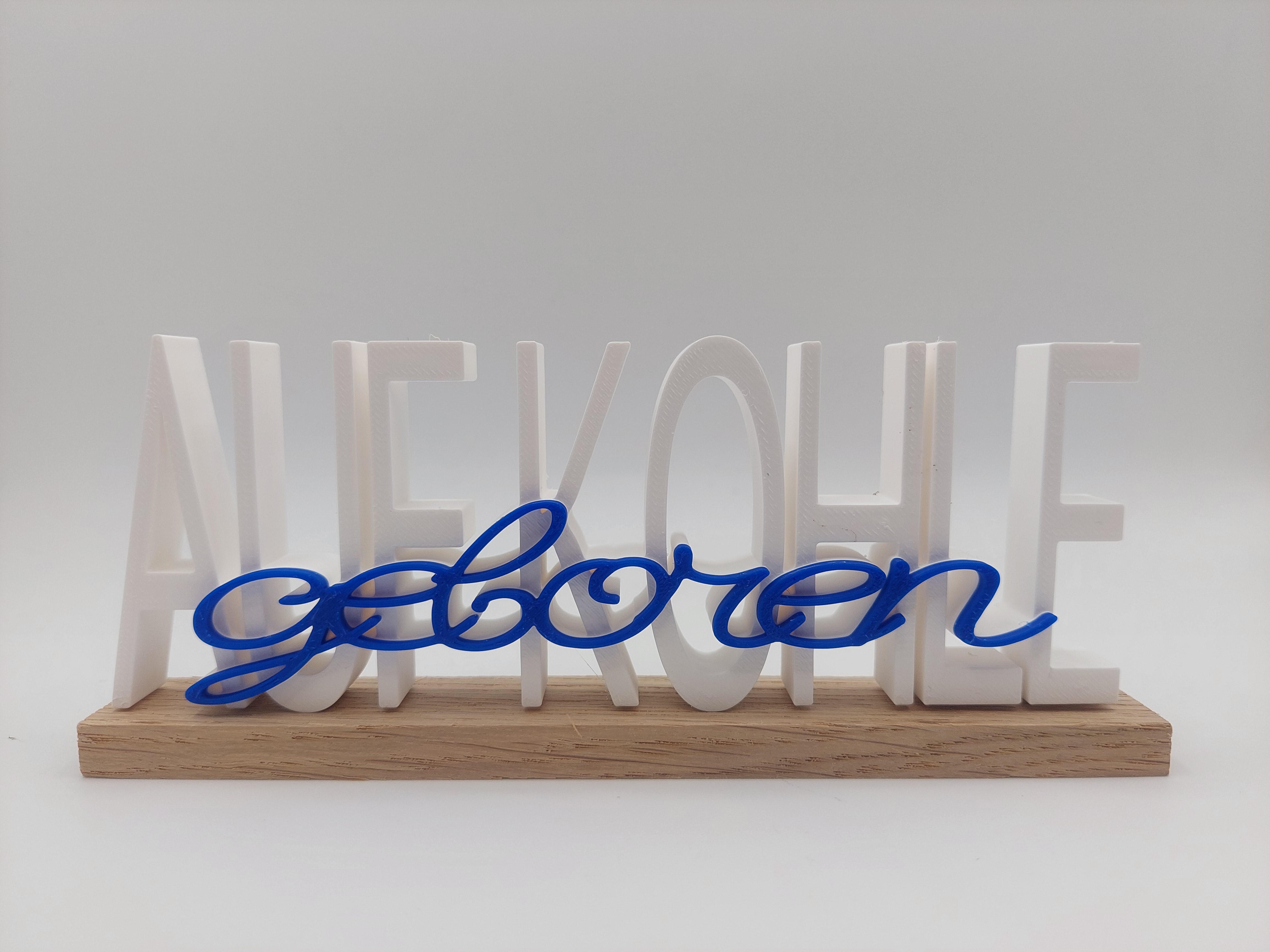 Auf Kohle geboren-Schriftzug