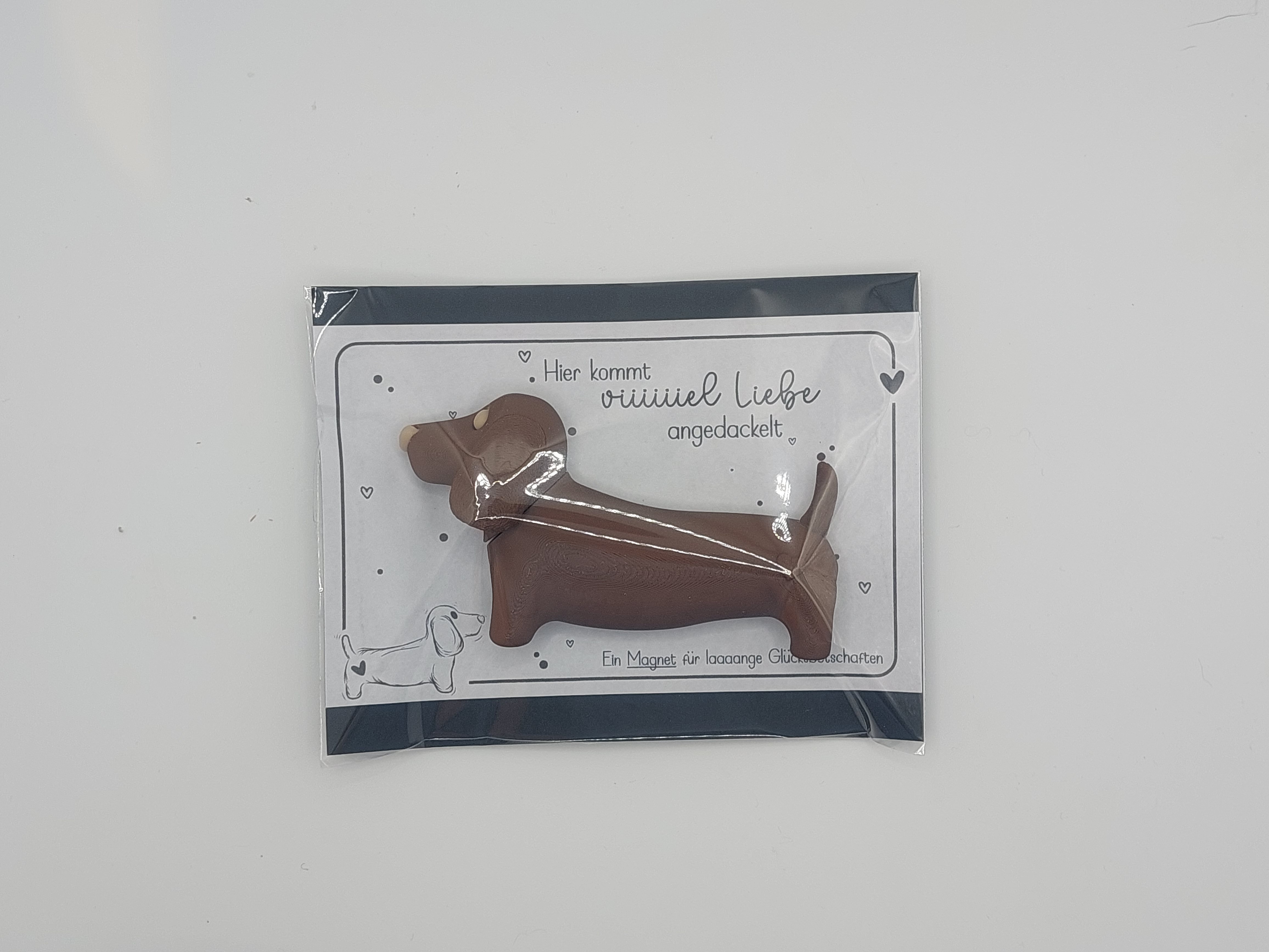 Niedlicher Hundemagnet als Glücksbringer