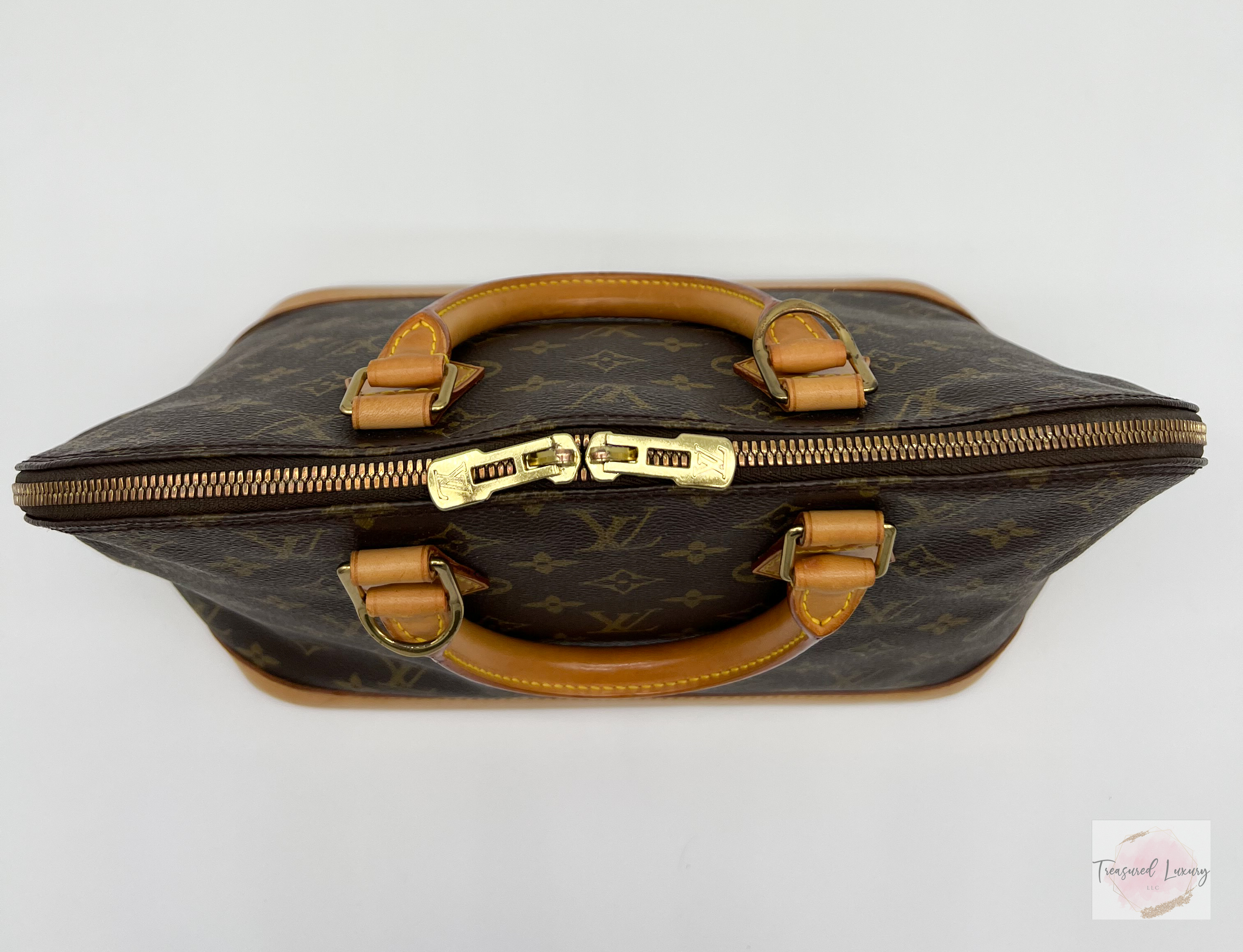 LOUIS VUITTON ALMA PM