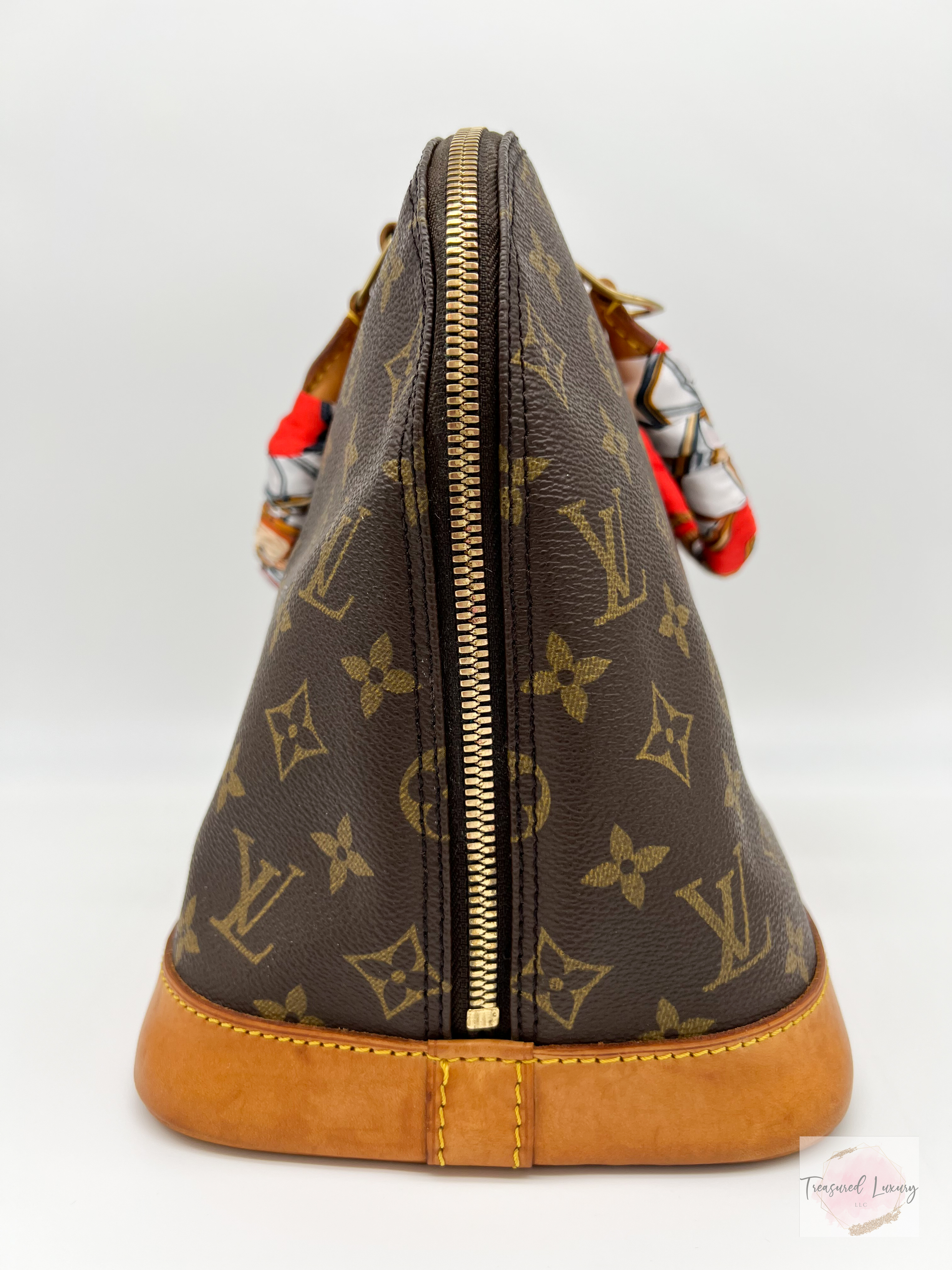 LOUIS VUITTON ALMA PM