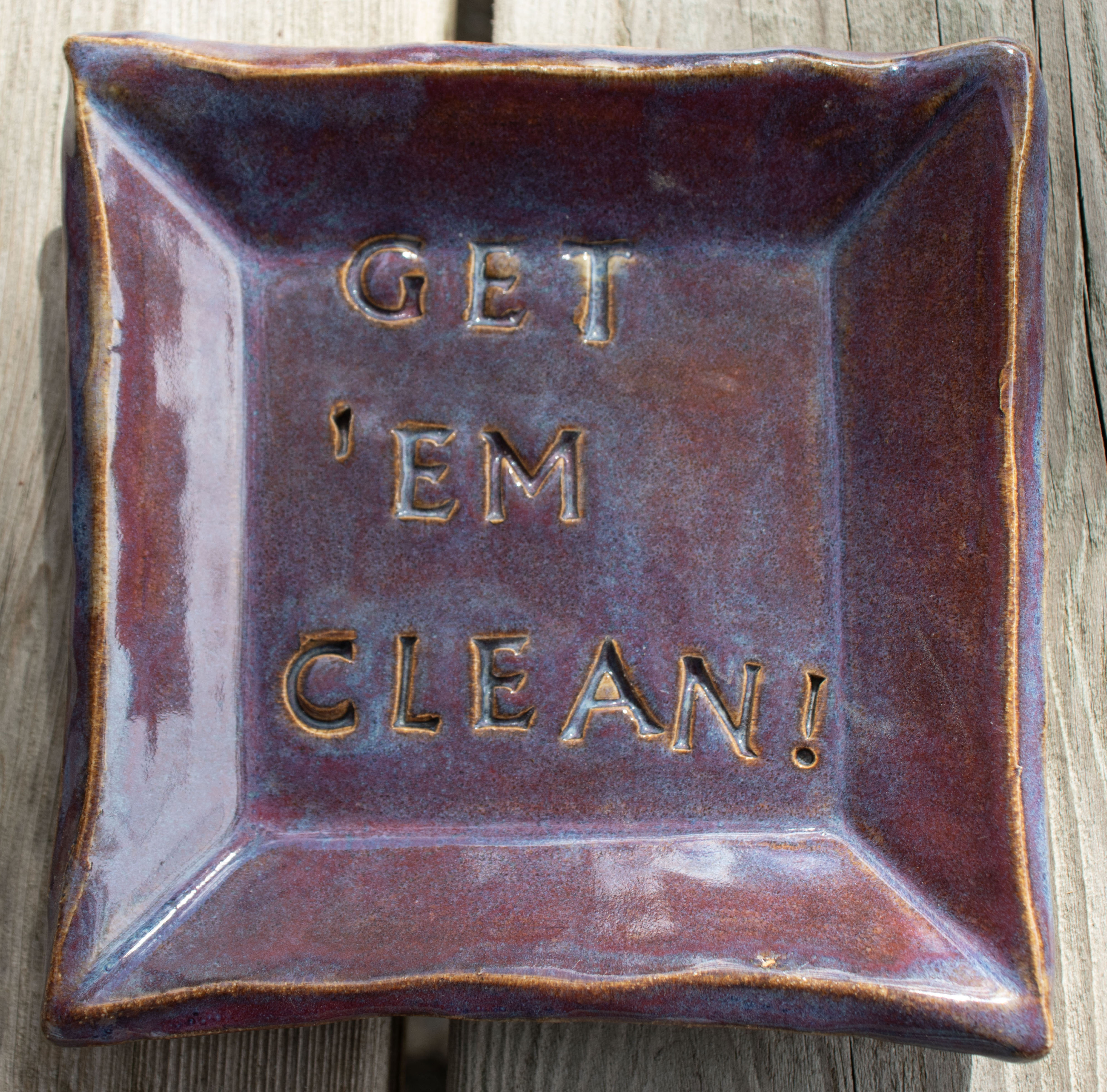 Handbuilt stoneware imprinted soap dish, Get 'Em Clean! pattern. 
