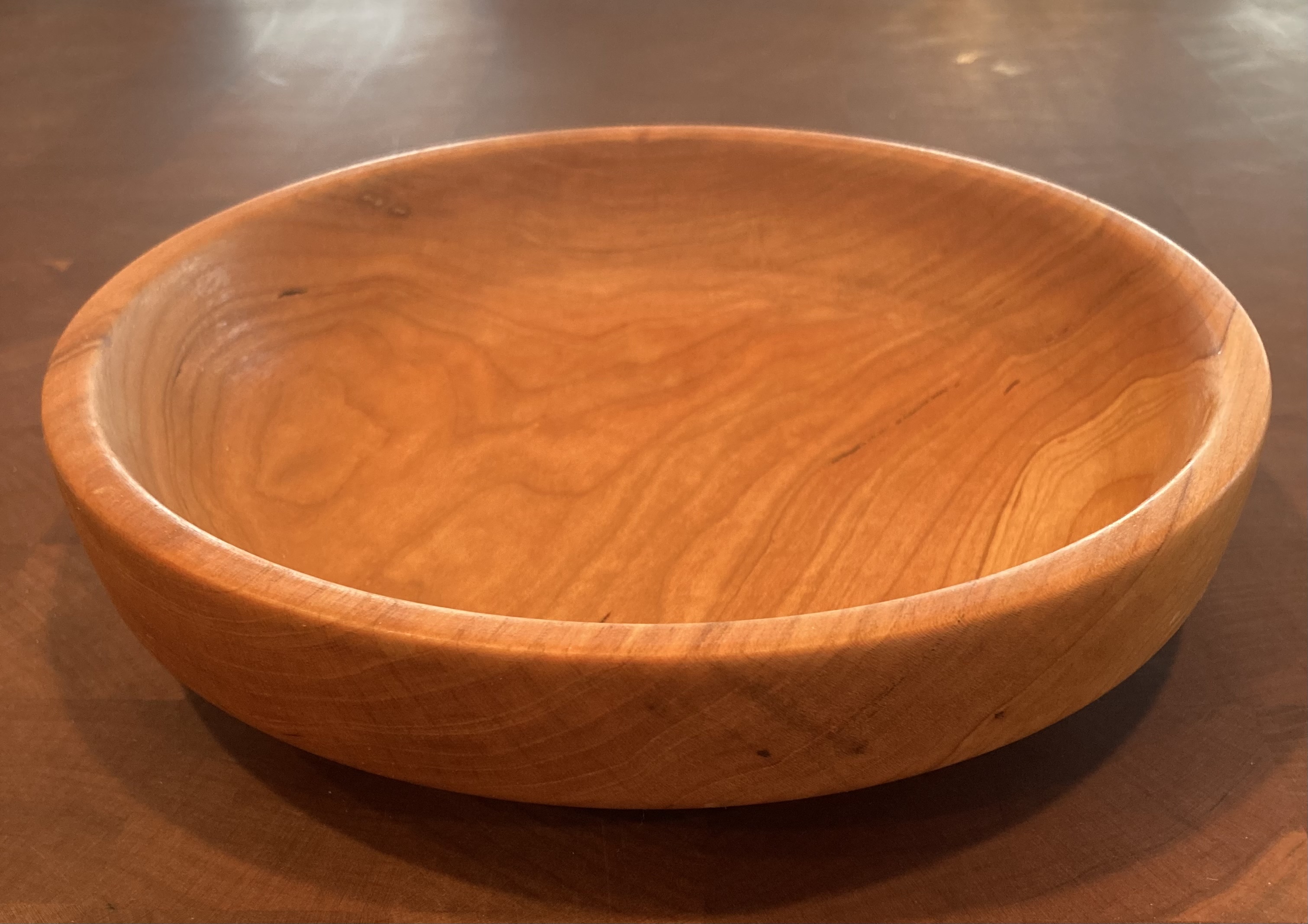 Cherry flat bowl, perfect for chips. Approx 1 7/8" tall and 8 1/2" diameter.
