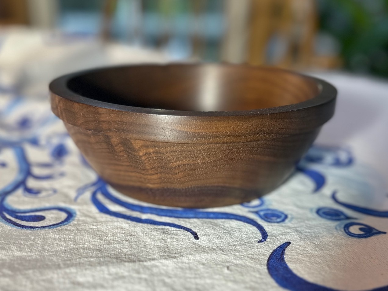 Walnut Bowl Approx 2 1/2" tall and 7 1/2" diameter.