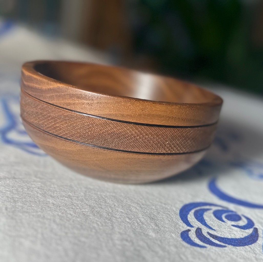 Walnut Bowl with Textured Band Approx 2 1/2" tall 5 3/4" diameter.
