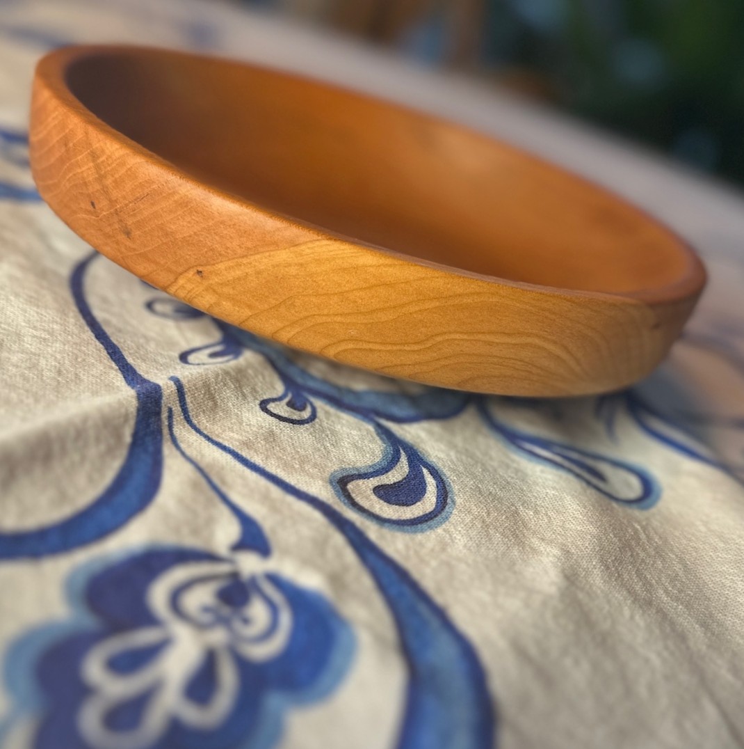 Cherry flat bowl, perfect for chips. Approx 1 7/8" tall and 8 1/2" diameter.