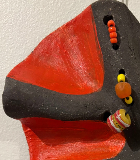 Masque perlé orangé et jaune