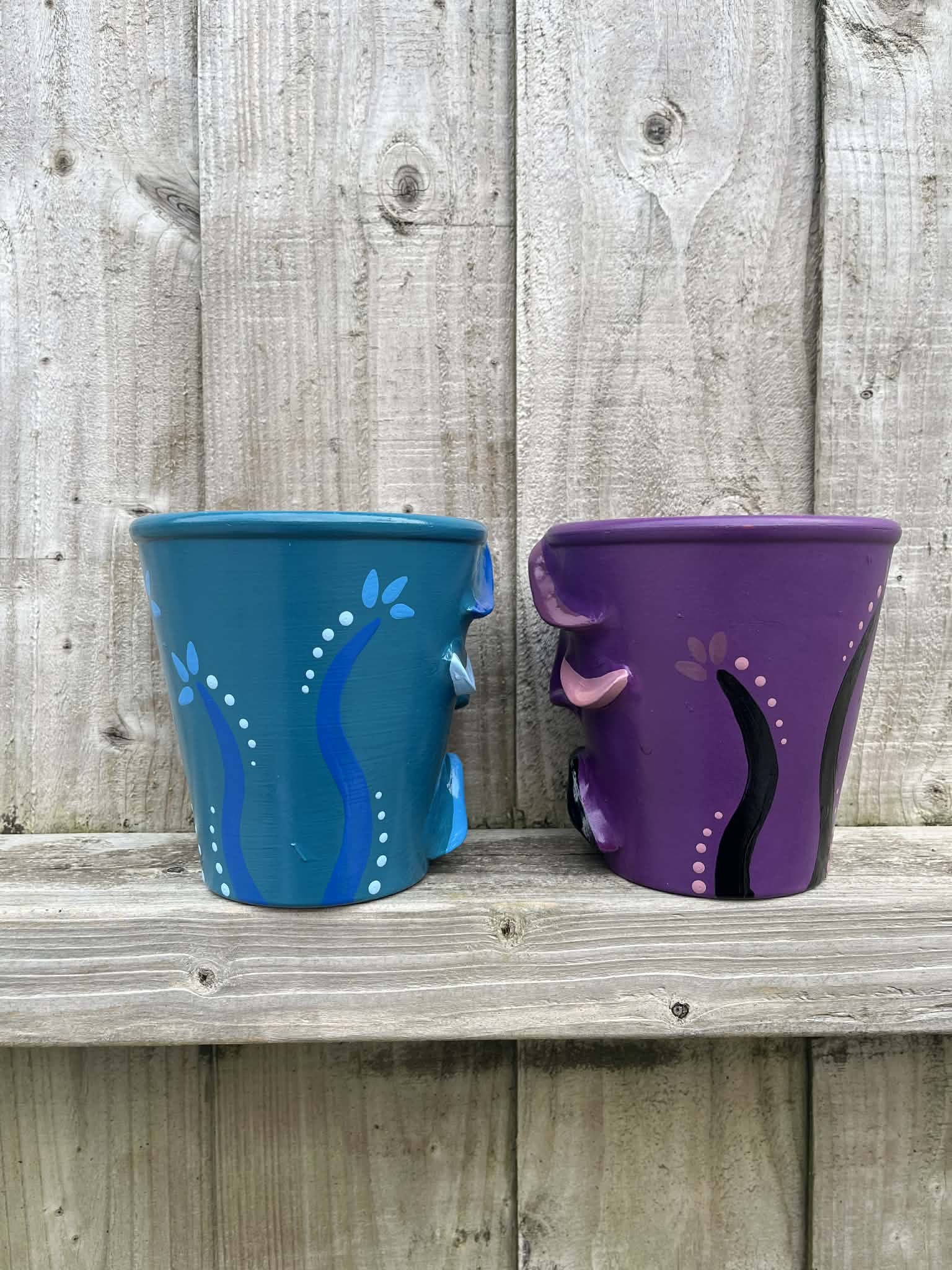 Pair of Small Sad Face Pots