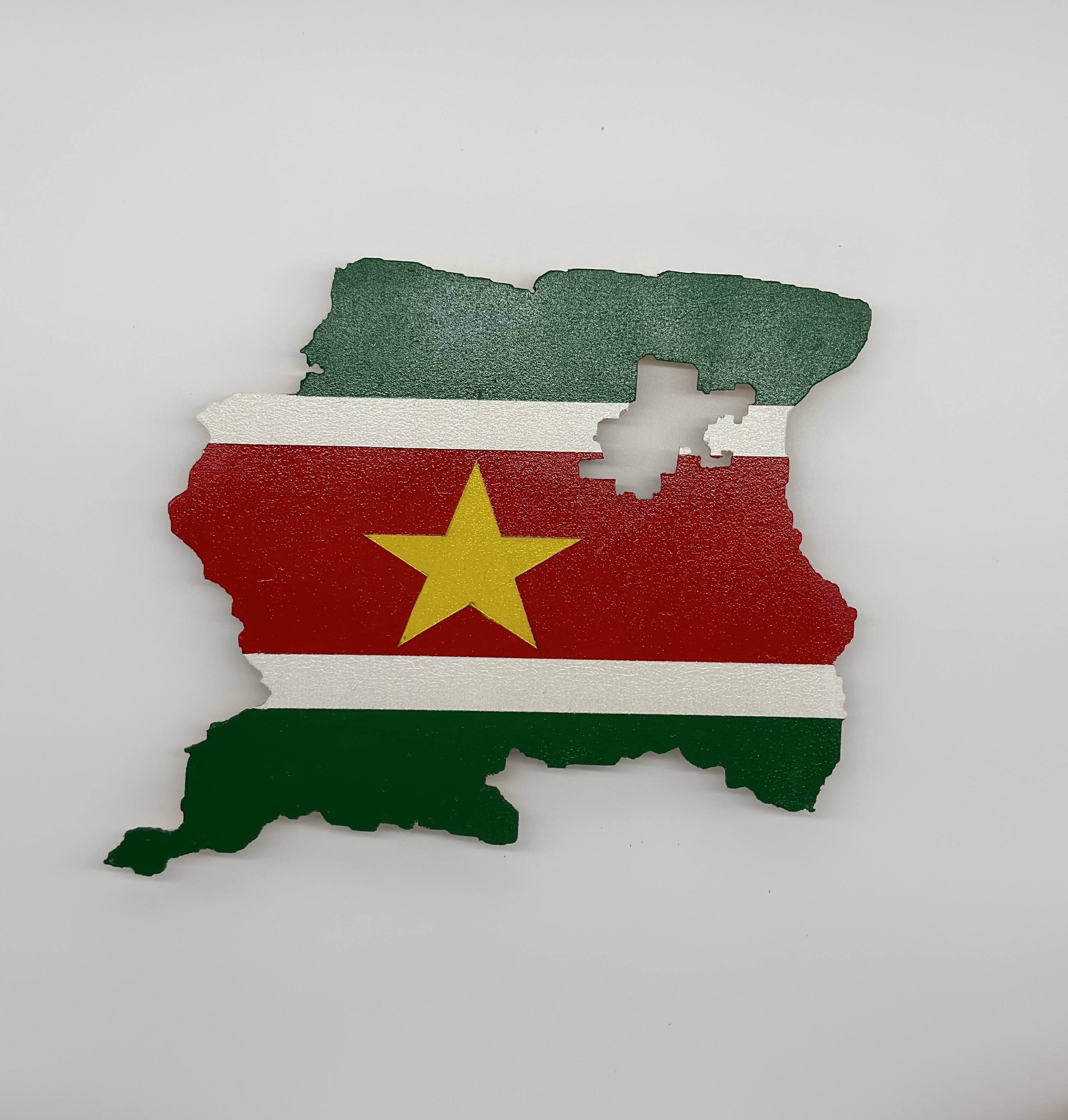Suriname met een jasje van de vlag