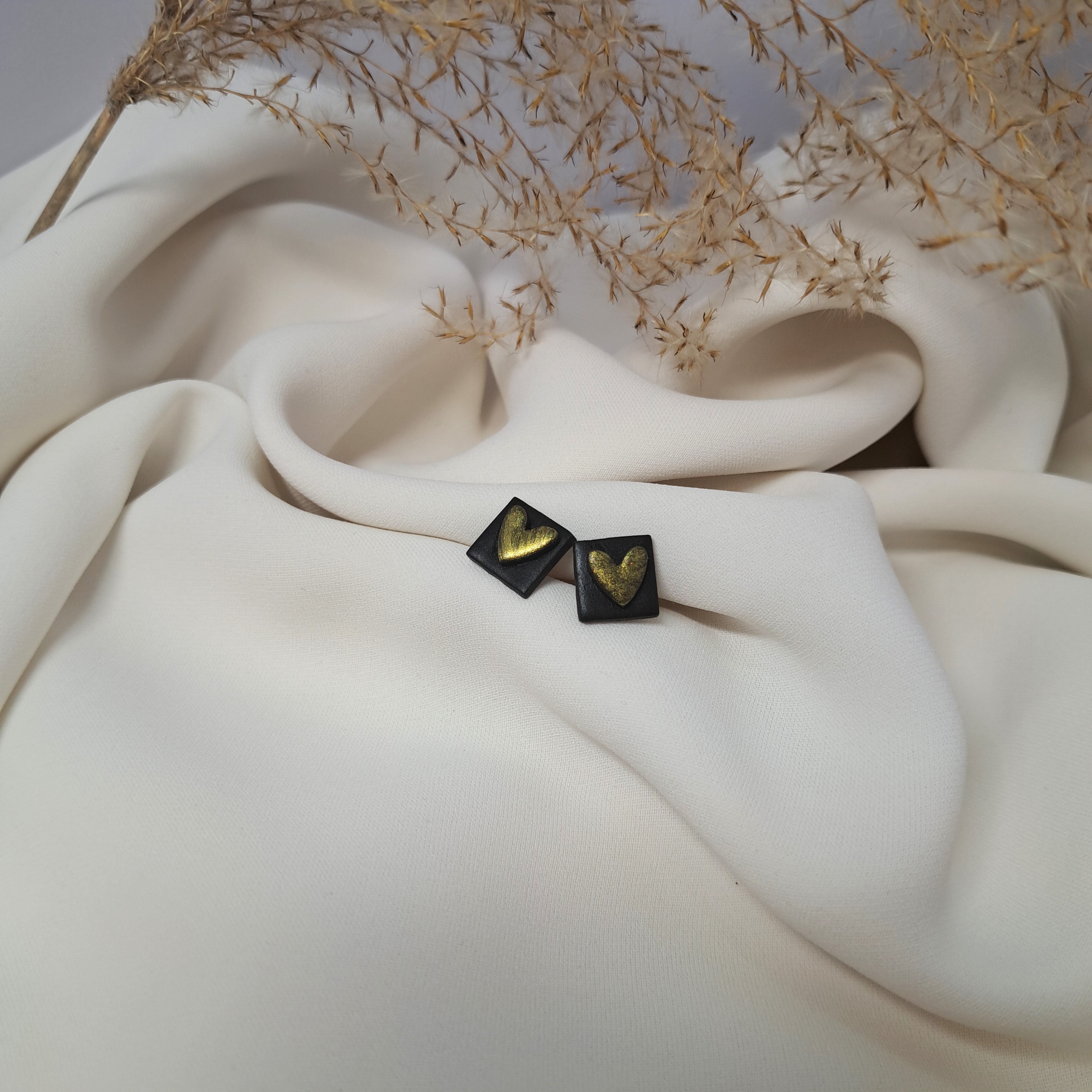 Black square golden heart