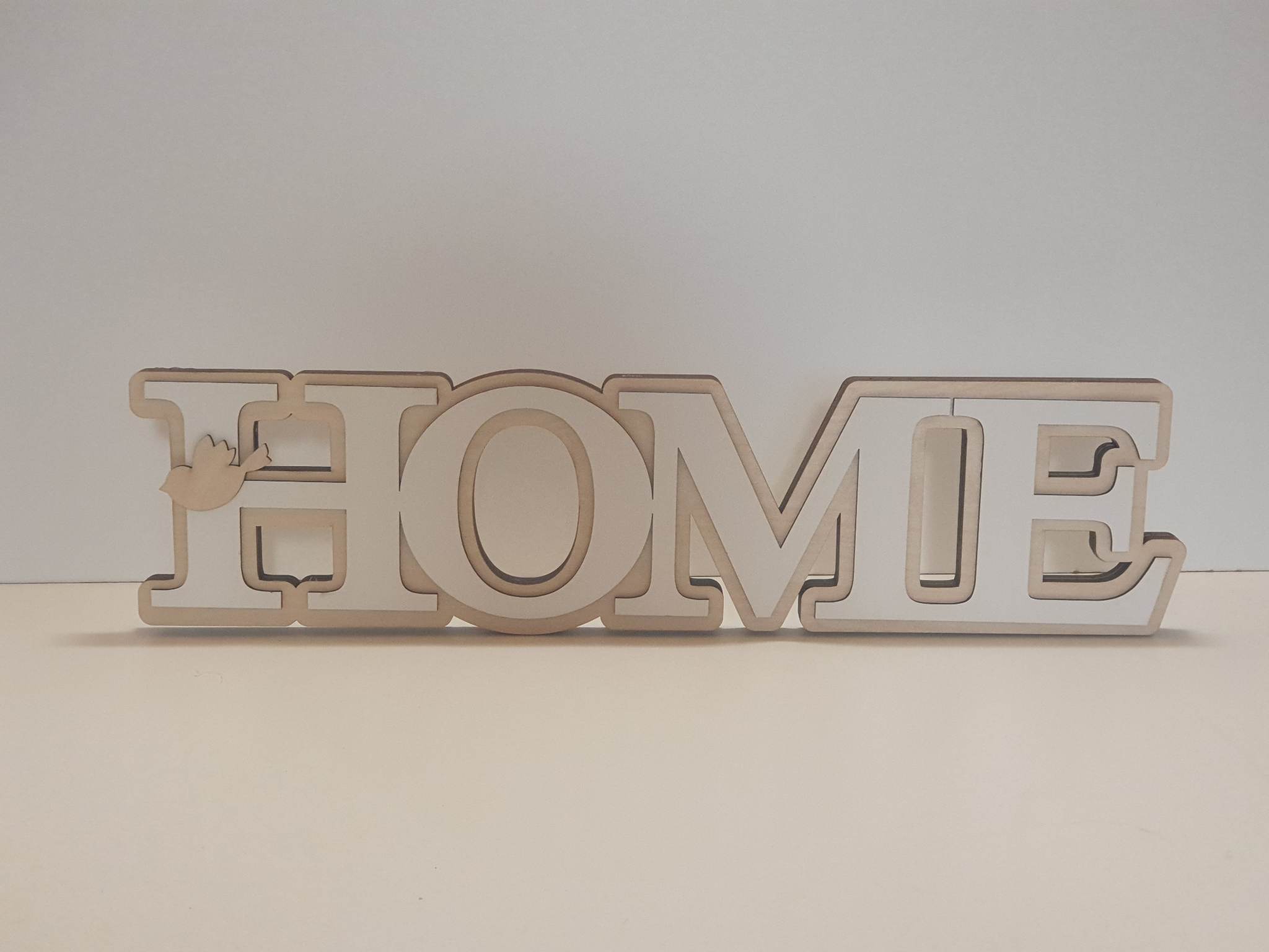 Pastatomas žodis ,,HOME''