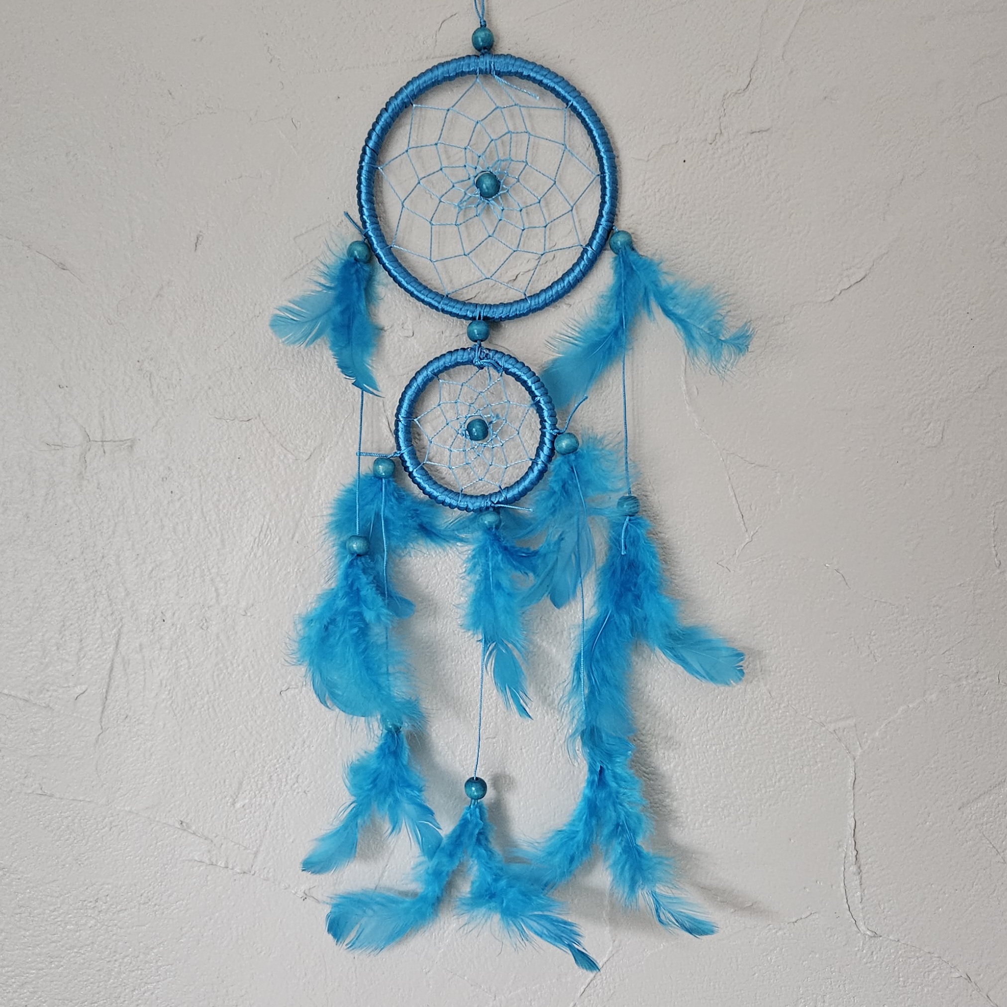Attrape-rêves plumes bleues