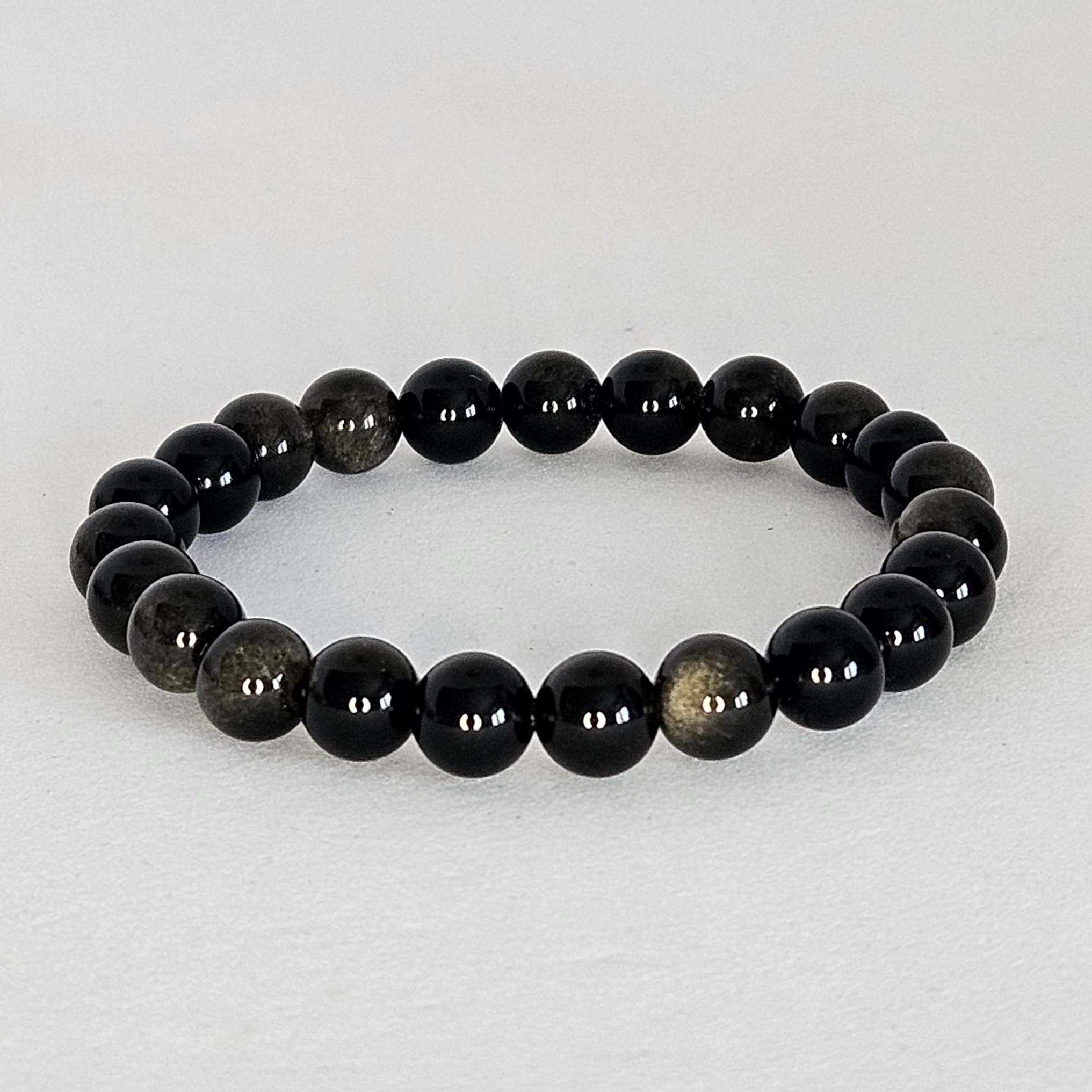 Bracelet en perles obsidienne dorée