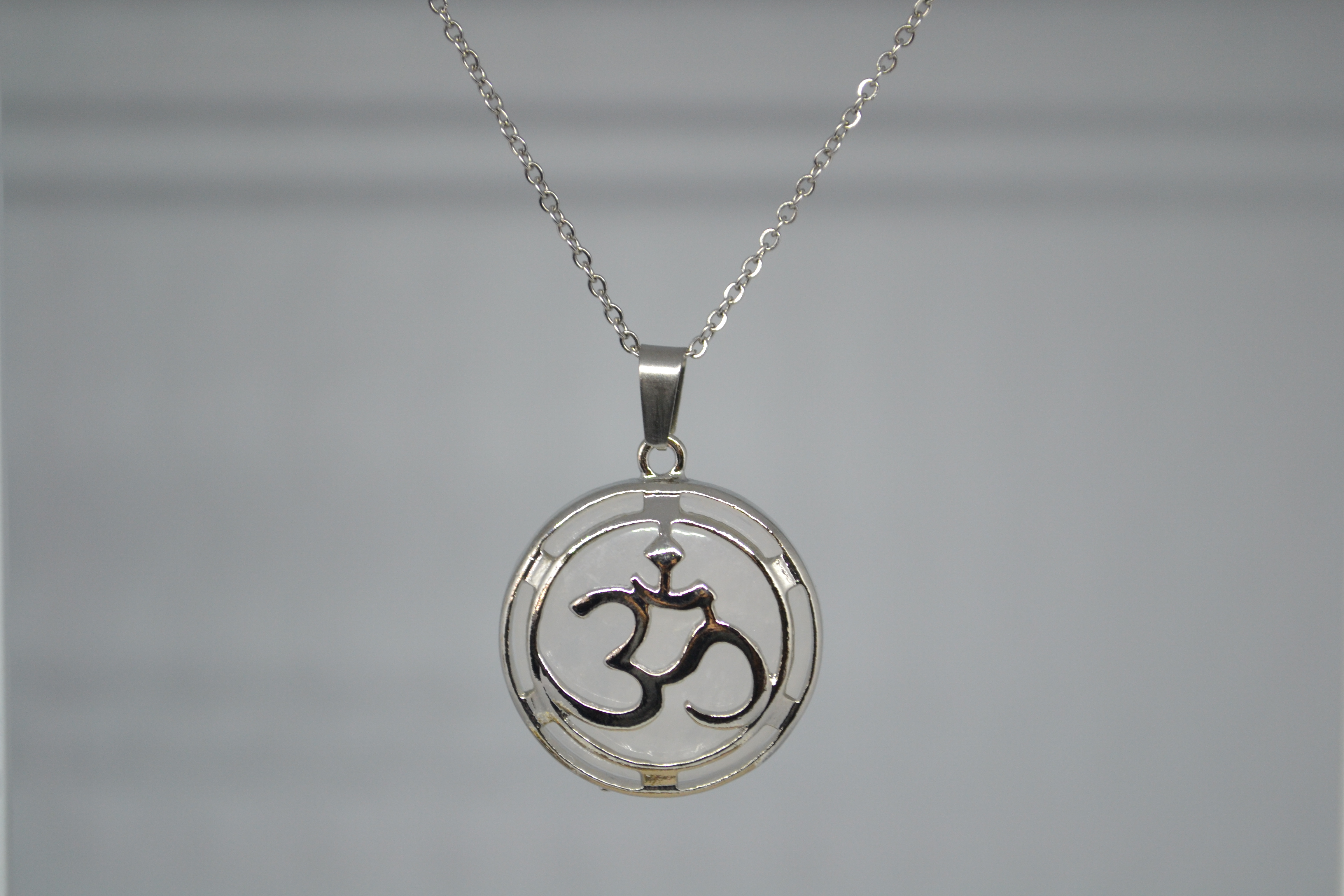 Pendentif Om Cristal de roche