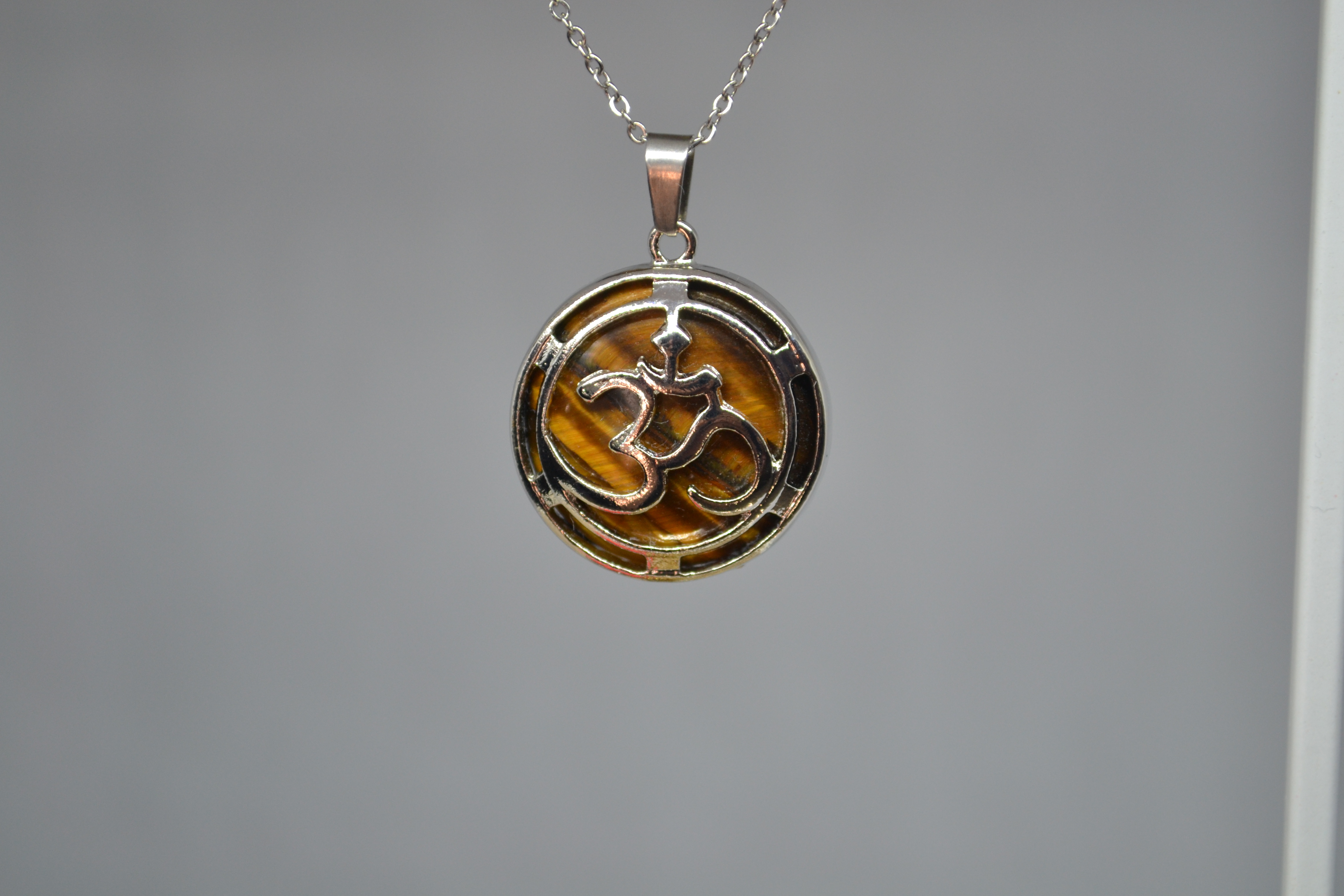 Pendentif Om Œil de tigre