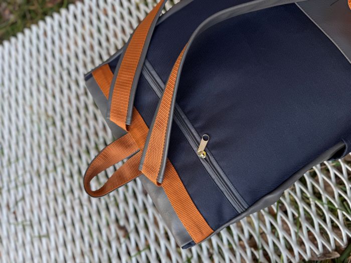 Kuprinė su plastikiniais užsegimais 